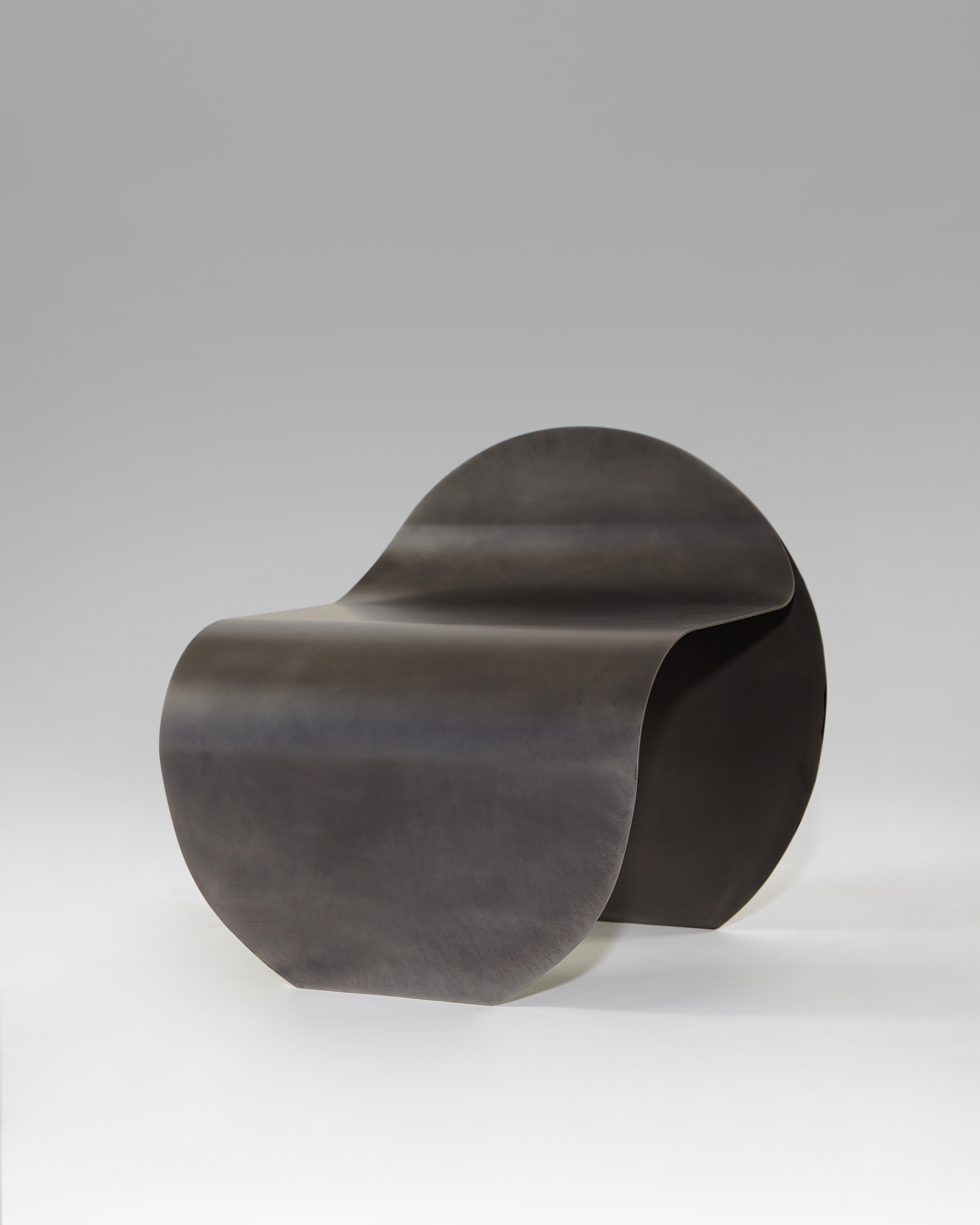 The O Stool reinterprets the circular form, exploring its limits through a series of unfolding and folding gestures that transform the typically rigid steel into an expression of fluidity. This stool pairs its sculptural elegance with impressive