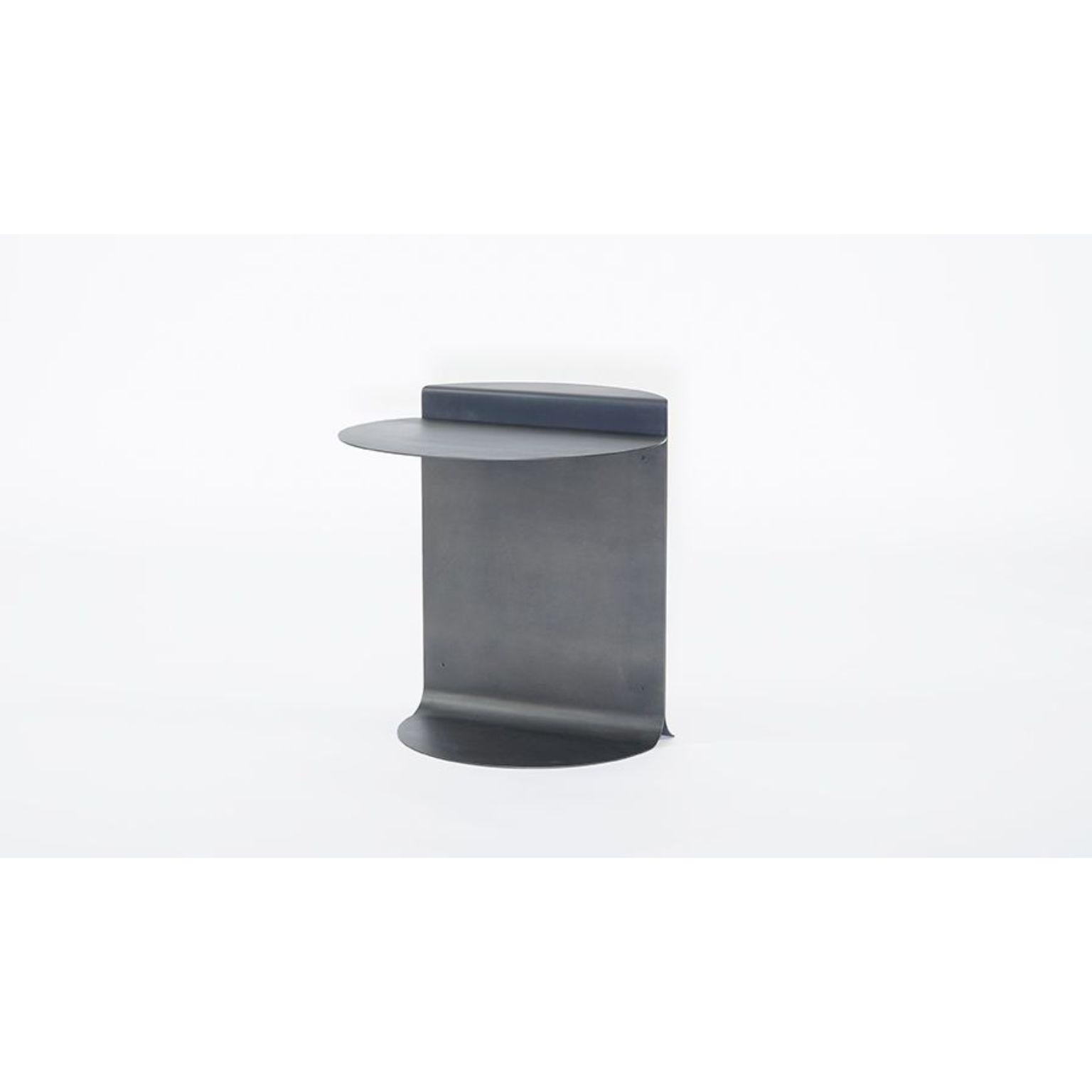 O Tabe by Estudio Persona
Dimensions: W 50.8 x D 50.8 x H 53.4 cm
Materials: Blackened stainless steel

Side table in blackened stainless steel or powder coated steel.
Outdoor version available in stainless steel with polyurethane