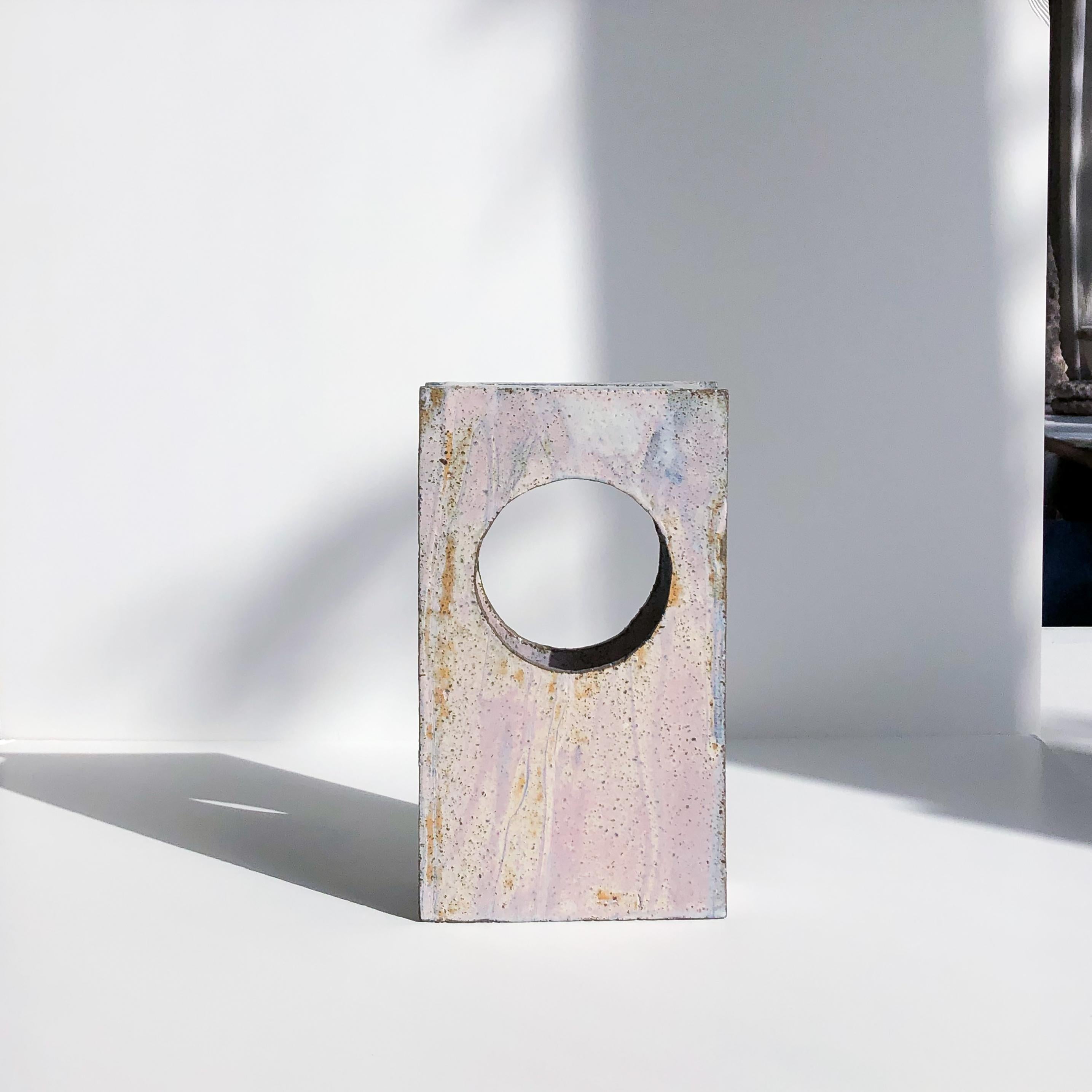 O vase I by Wendy Taylor
Dimensions: D15 x W5.5 x H26.5 cm
Materials: stoneware, glazed.
Glaze colour/ surface pattern will vary.

Wendy Taylor's clay slab constructed works are influenced by elements of the built environment, particularly the