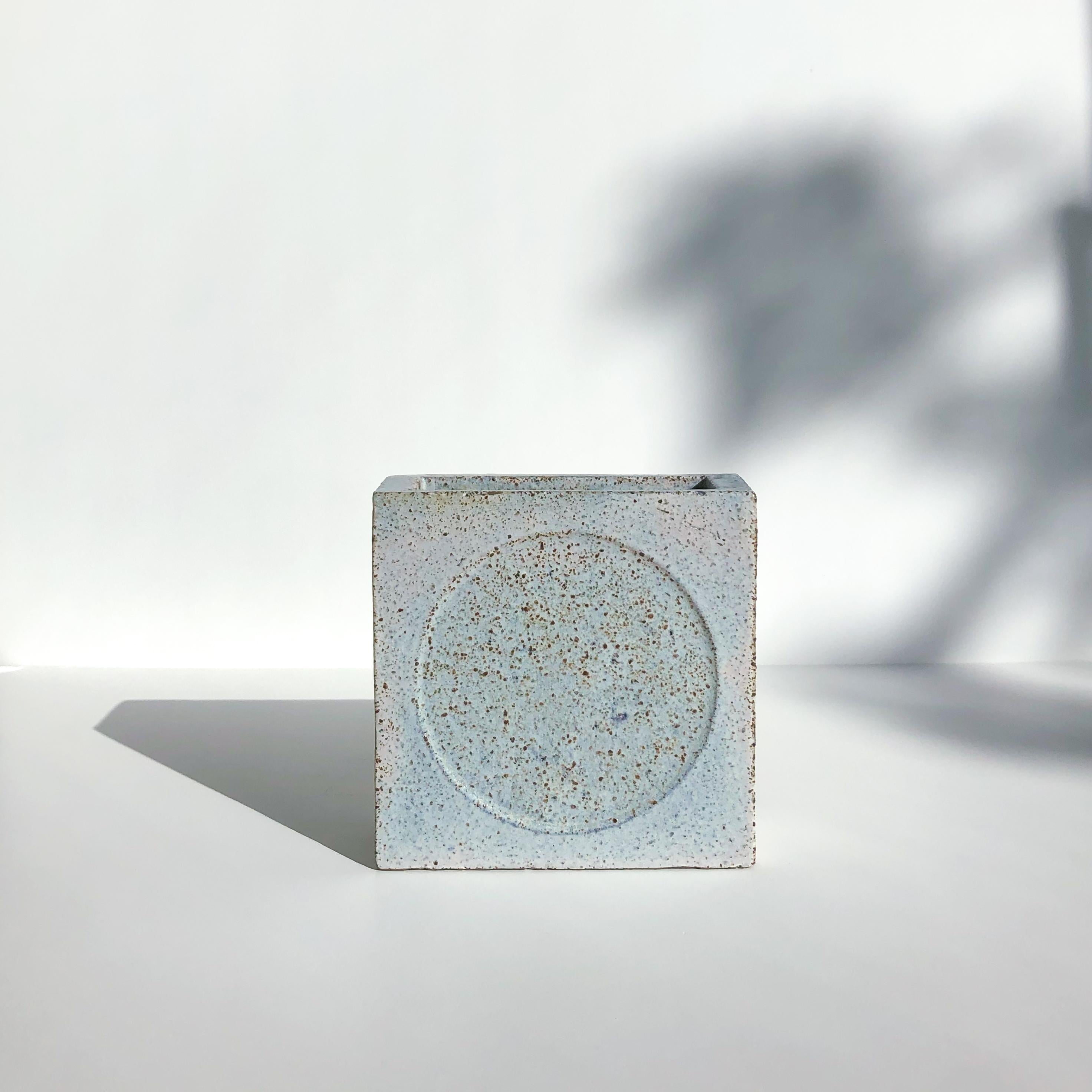 O vase III by Wendy Taylor
Dimensions: D10.5 x W9.5 x H25.5 cm
Materials: stoneware, glazed
Glaze colour/ surface pattern will vary.

Wendy Taylor's clay slab constructed works are influenced by elements of the built environment, particularly