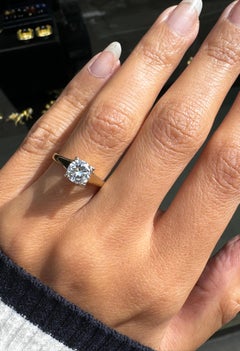 O.69 Carat Diamond and 18 Carat Yellow and White Gold Solitaire Engagement Ring