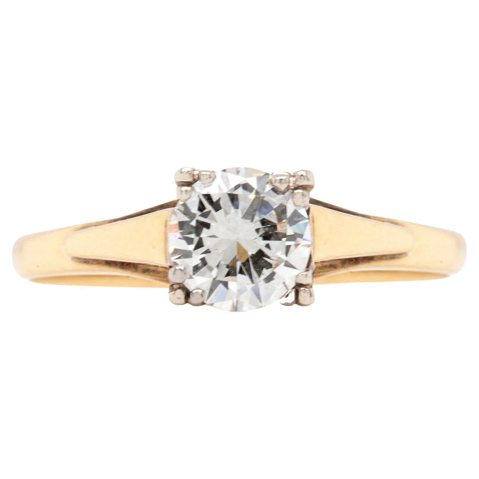 O.69 Carat Diamond and 18 Carat Yellow and White Gold Solitaire Engagement Ring