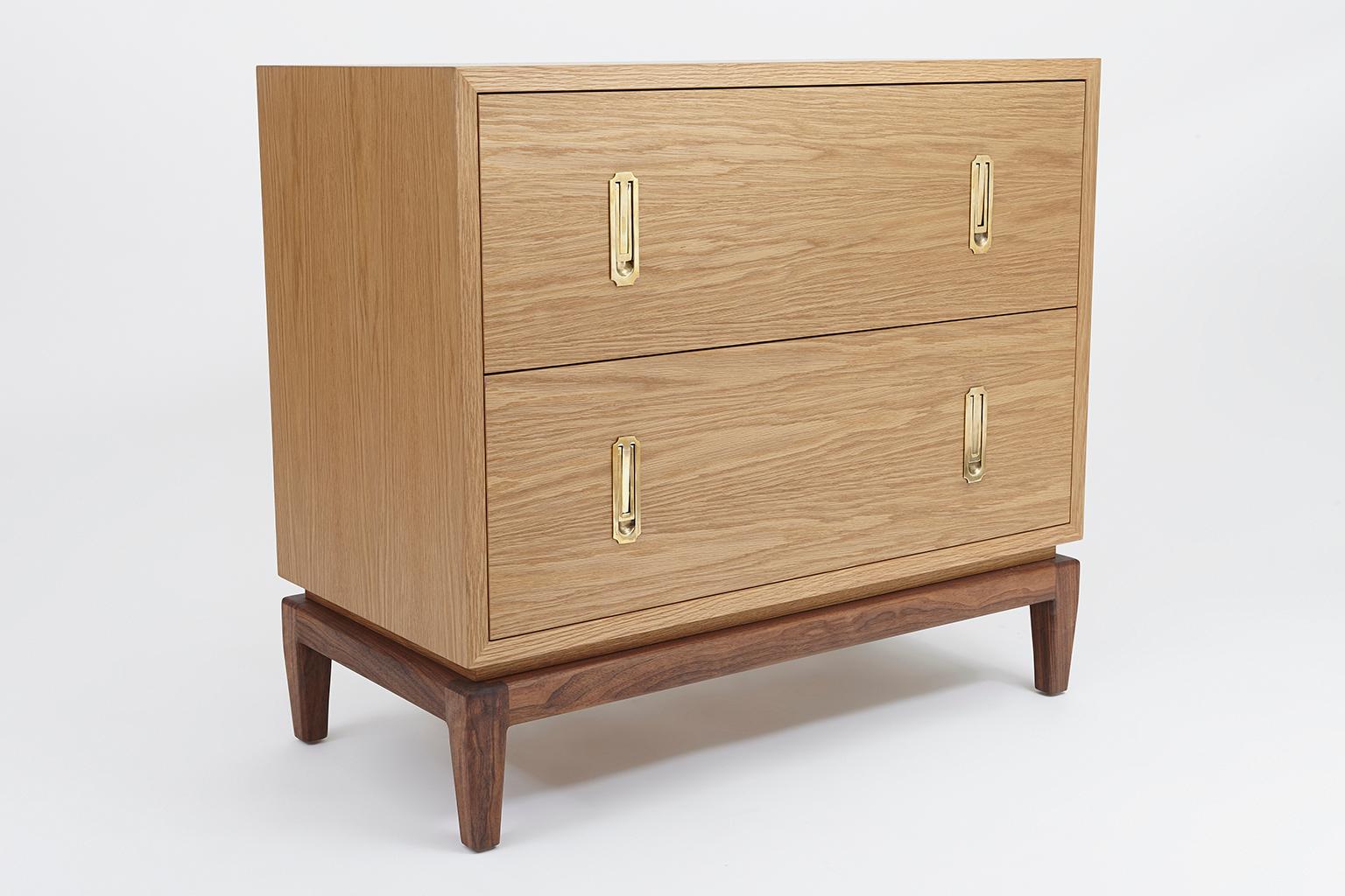 Oak 2-drawer Arcadia chest by Lawson-Fenning with walnut base. The 2-drawer Arcadia Chest features two drawers or two doors, cast brass hardware and a sculptural solid American walnut or white oak base. 

The Lawson-Fenning Collection is designed