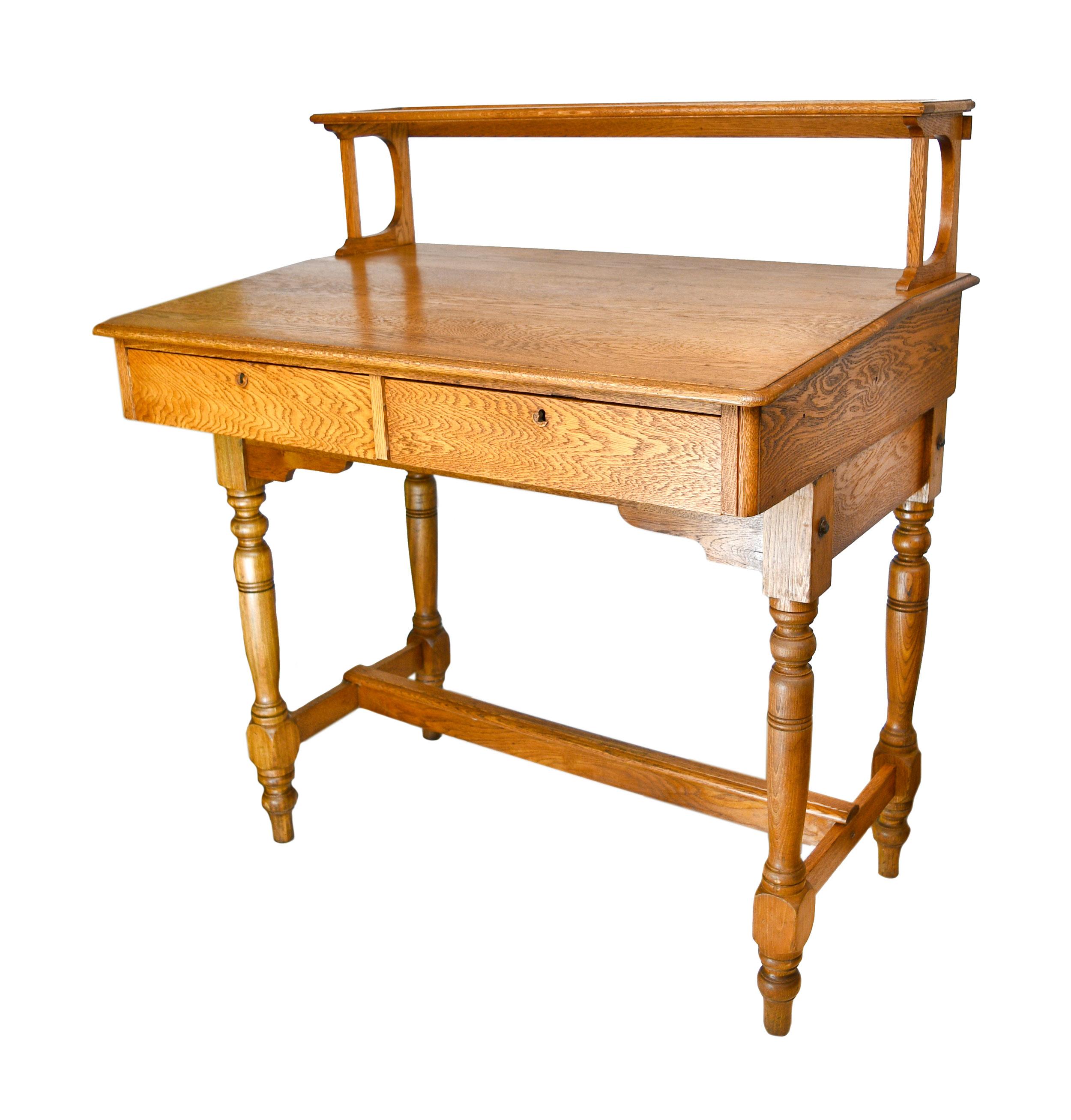 This gorgeous standing desk is made of lovely oak and features two large drawers. The richness of the wood grain on this desk needs to be seen to believe!

Measures: 48” wide x 33” deep x 44” tall (upper shelf adds 11” to the height)

The desk