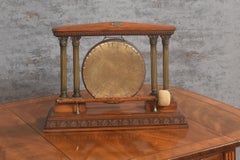 Oak and brass table gong