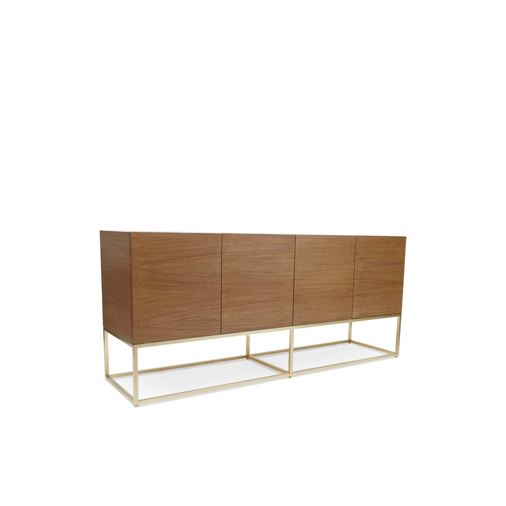 The thin frame cabinet is a four-door case piece with a thin, plated steel base. The interior includes one drawer and adjustable shelves.  

The Lawson-Fenning Collection is designed and handmade in Los Angeles, California. Reach out to discover