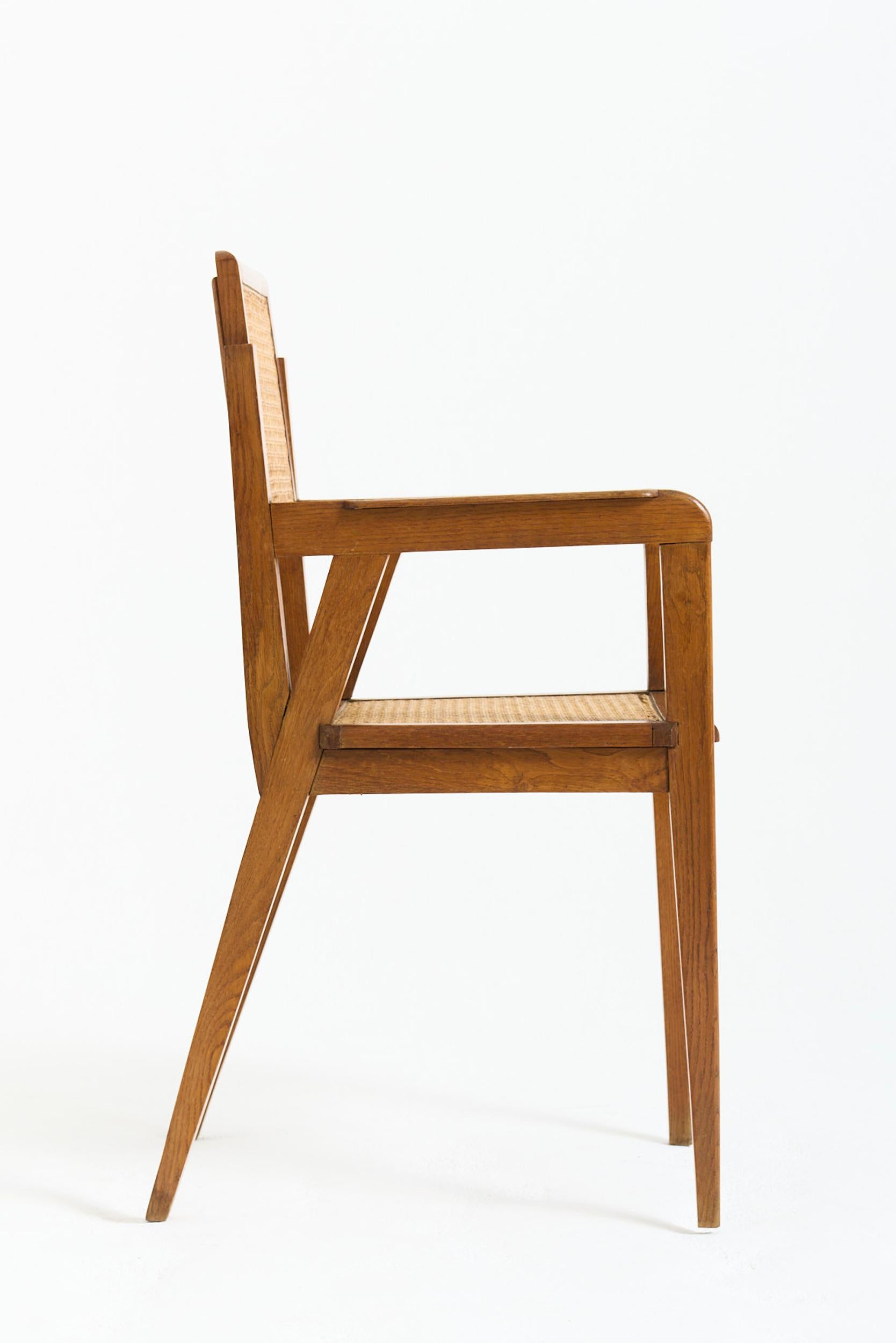 Mid-Century Modern Oak and Cane Armchair For Sale