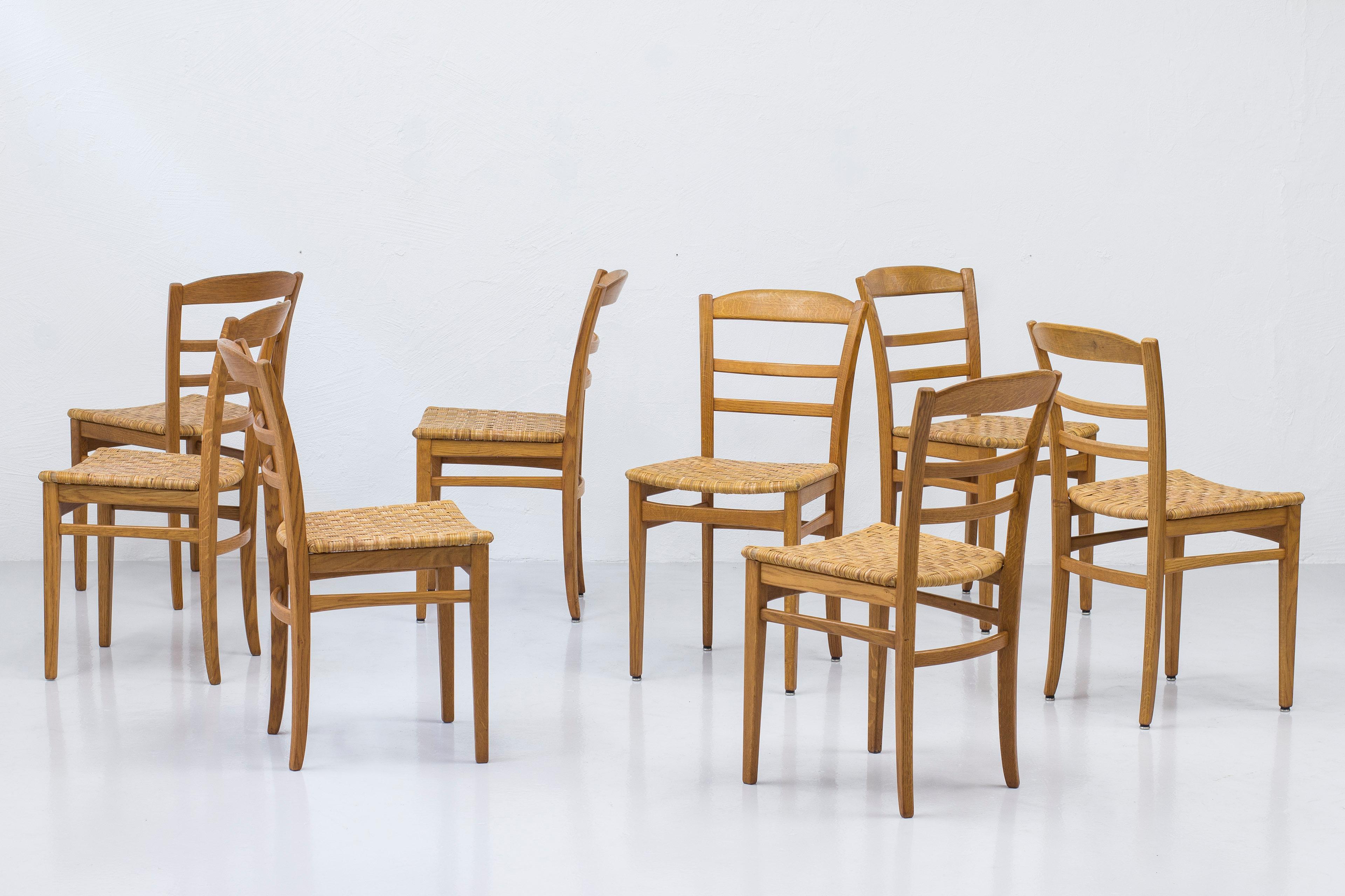 Scandinavian Modern Oak and Cane Weave Dining Chairs by Carl Malmsten, Swedish Modern, 1950s For Sale