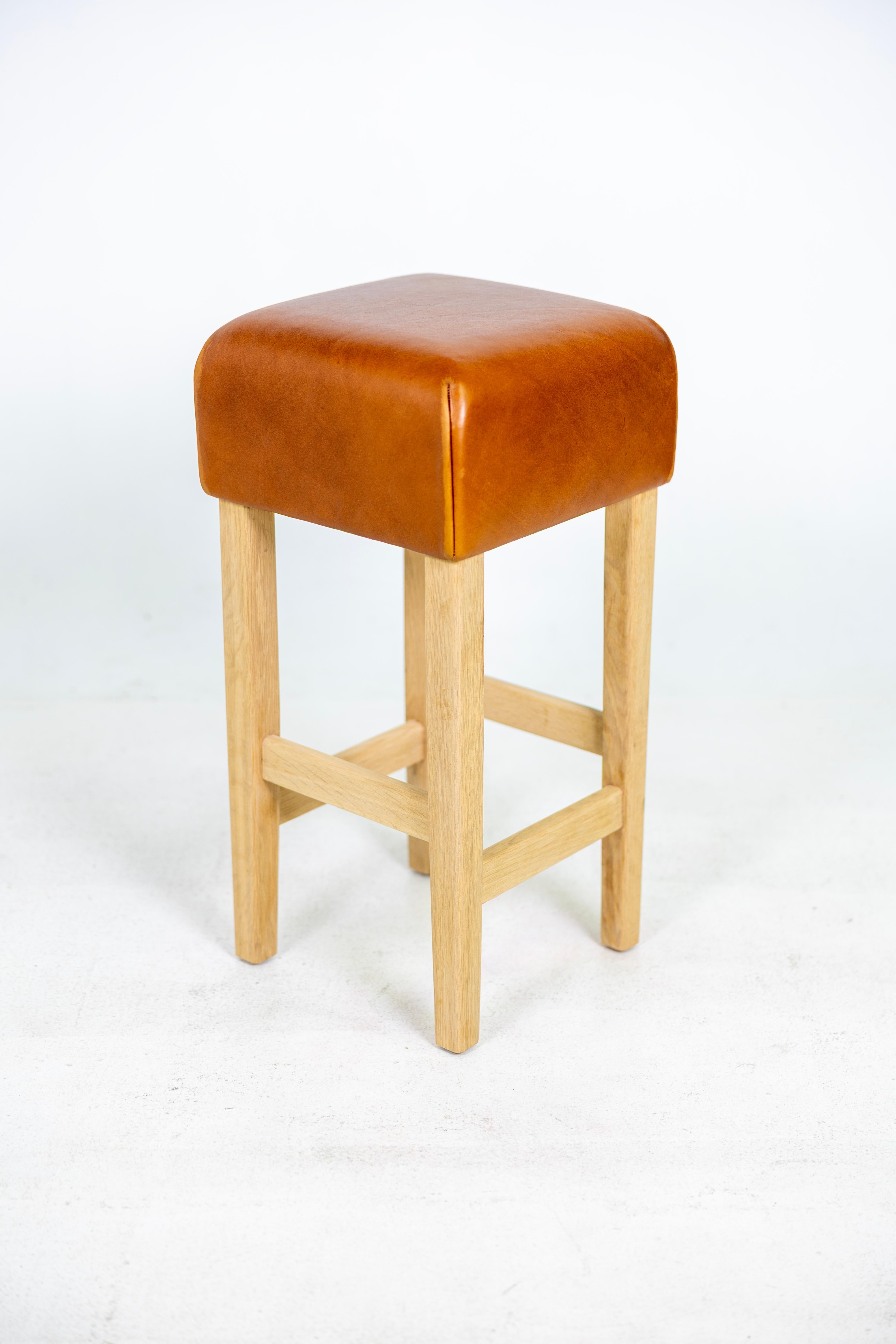 American Oak and Cognac Saddle Leather Bar Stool in the Style of Jean-Michel Frank For Sale