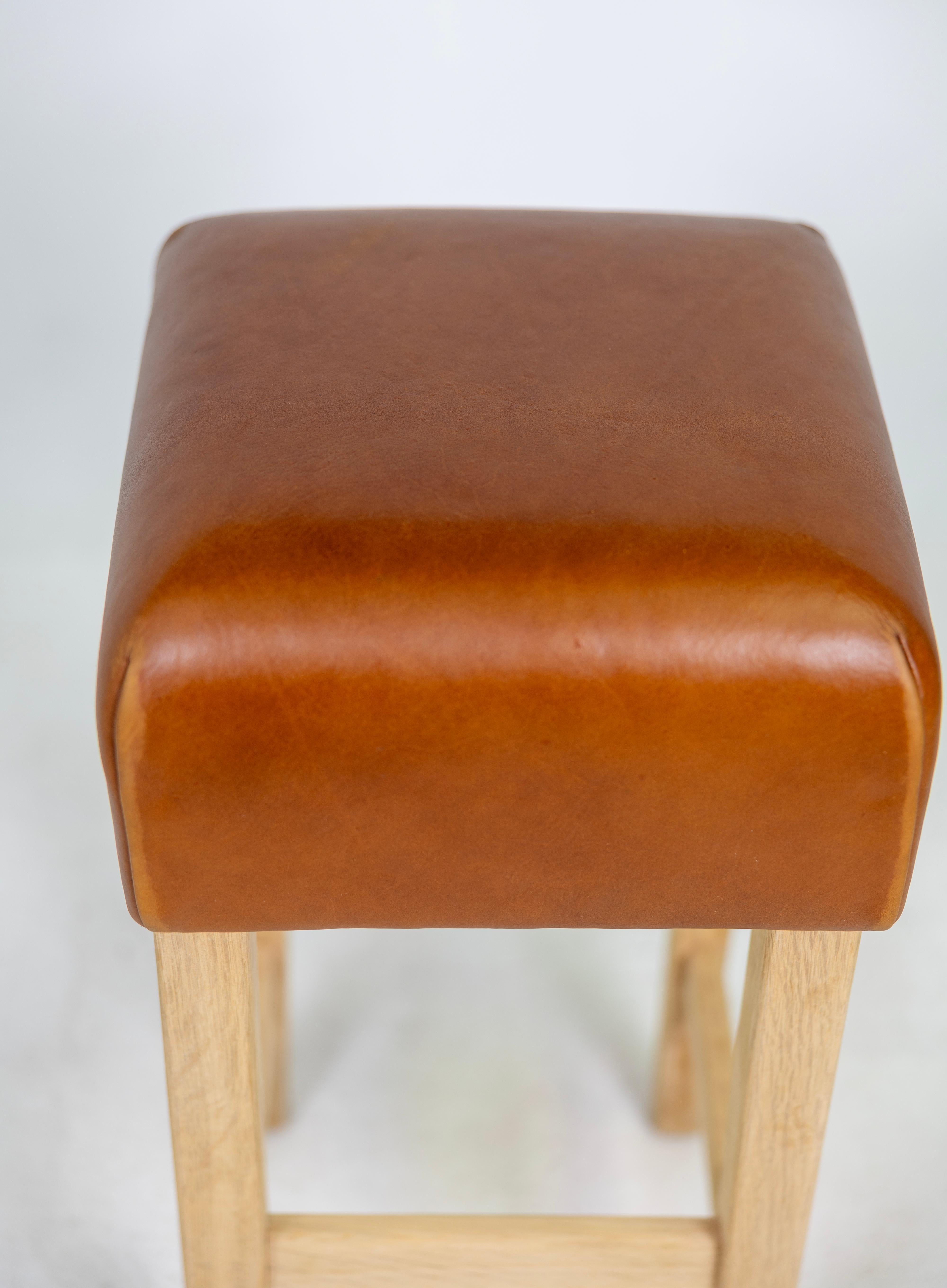 Oak and Cognac Saddle Leather Bar Stool in the Style of Jean-Michel Frank In Good Condition For Sale In Miami, FL