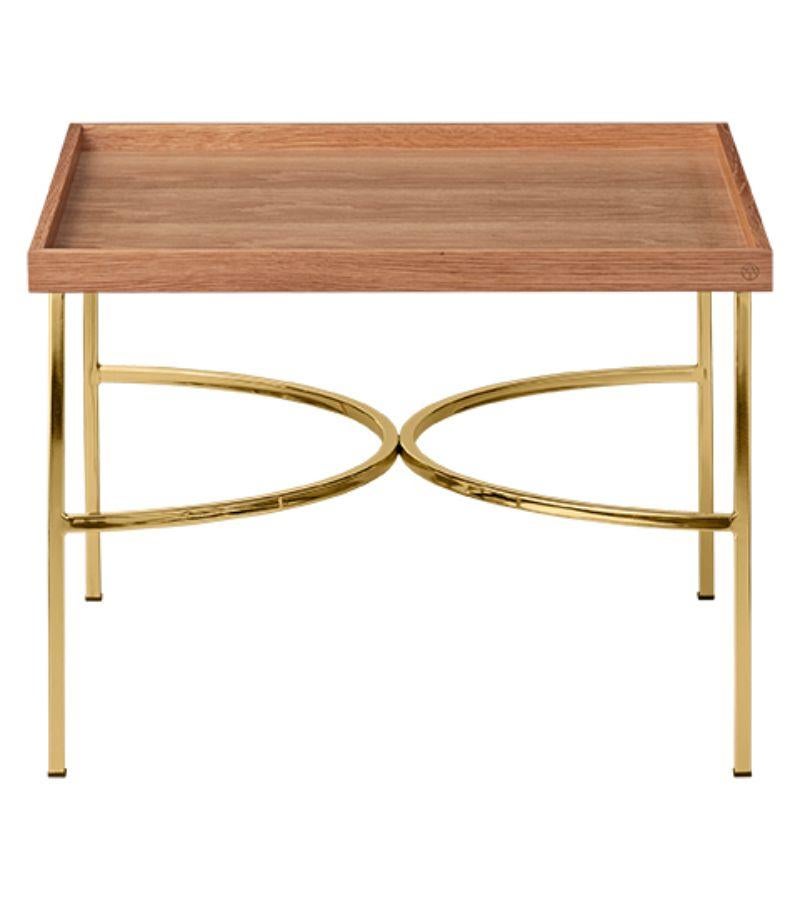 Oak and Gold Contemporary Tray Table 
Dimensions: D 52.5 x W 52.5 x H 38 cm 
Materials: Natural Walnut, Iron with Powder Coating, or Iron with Brass Plating.
Available in Black, Oak, Walnut, and Black or Gold Powder-Coated Base. Please contact us