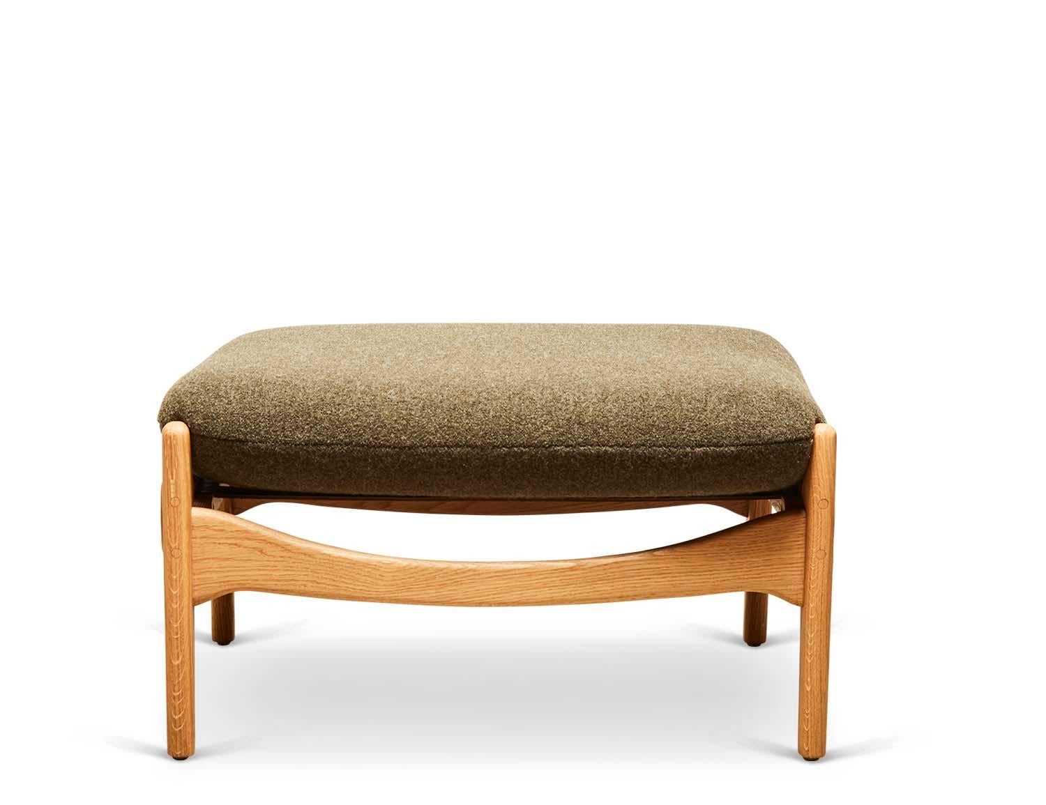 The Maker's ottoman has a solid walnut or oak frame, with a leather sling and loose cushion. Shown here in Oiled oak and dark green boiled wool. 

The Lawson-Fenning Collection is designed and handmade in Los Angeles, California.
Message us to find
