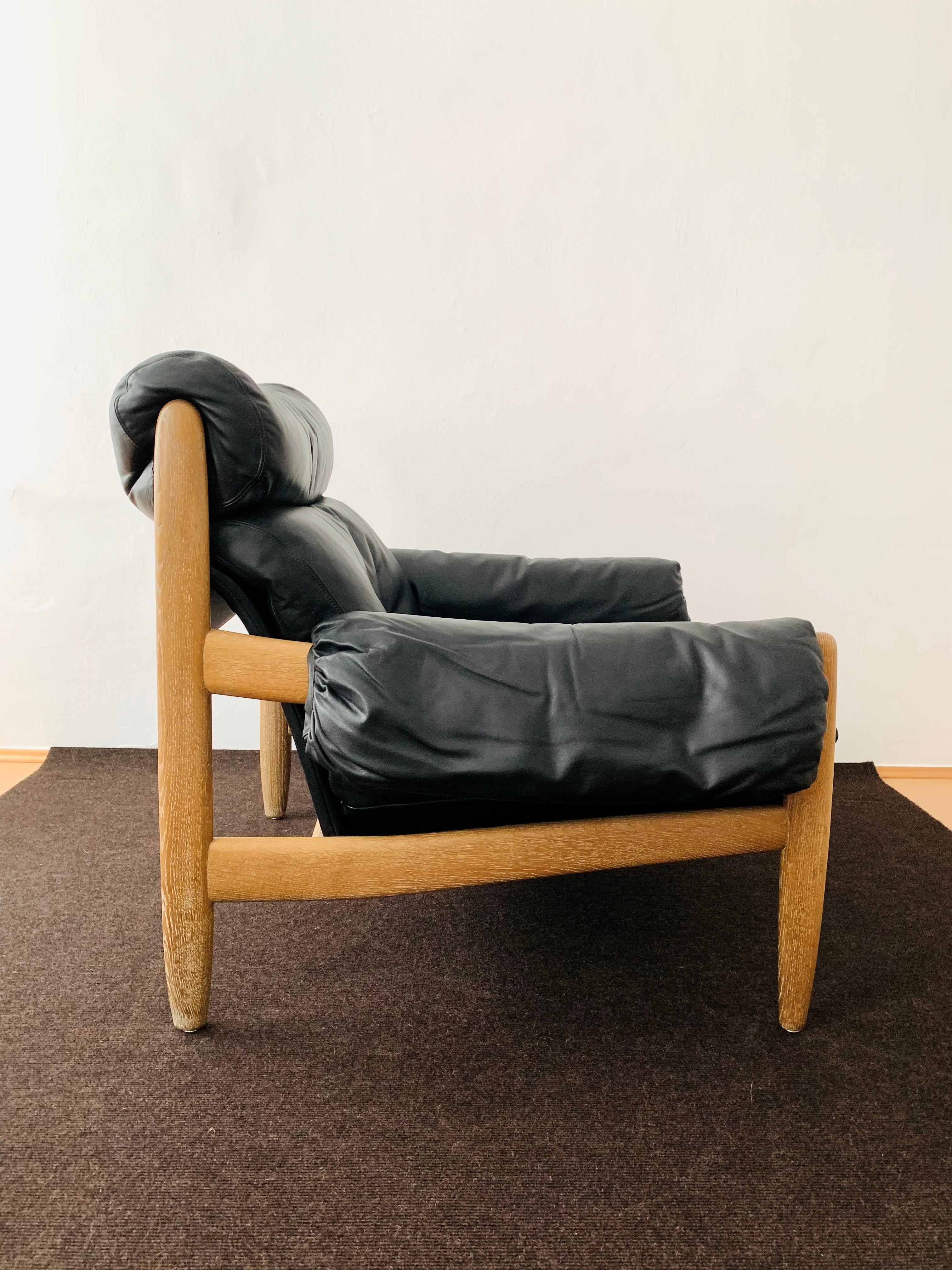 Leather Oak and leather lounge chair with ottoman For Sale