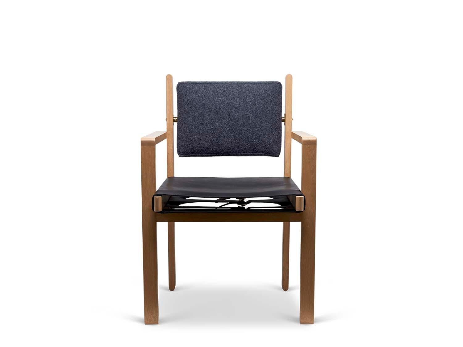The Morro dining chair is made from a solid American walnut or white oak frame and features an upholstered back cushion and a leather sling seat.

The Lawson-Fenning Collection is designed and handmade in Los Angeles, California. Reach out to