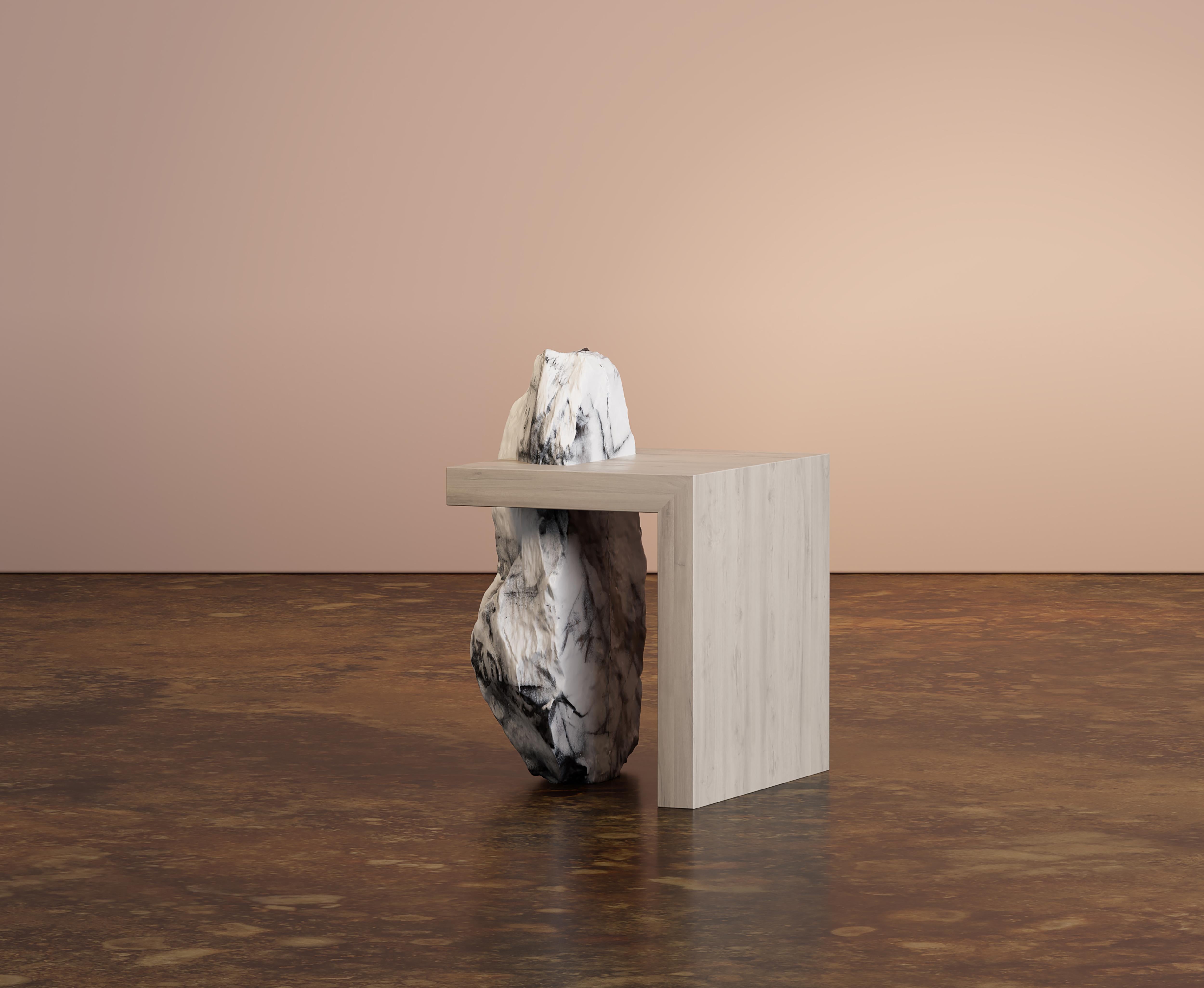 Z Atus is a provocative art talking piece, exposing the raw marble veins with an embedded wood top; it's the perfect addition to a living room or a bedroom. Composed of sustainable materials found in Portugal quarries. 
The ATUS collection was