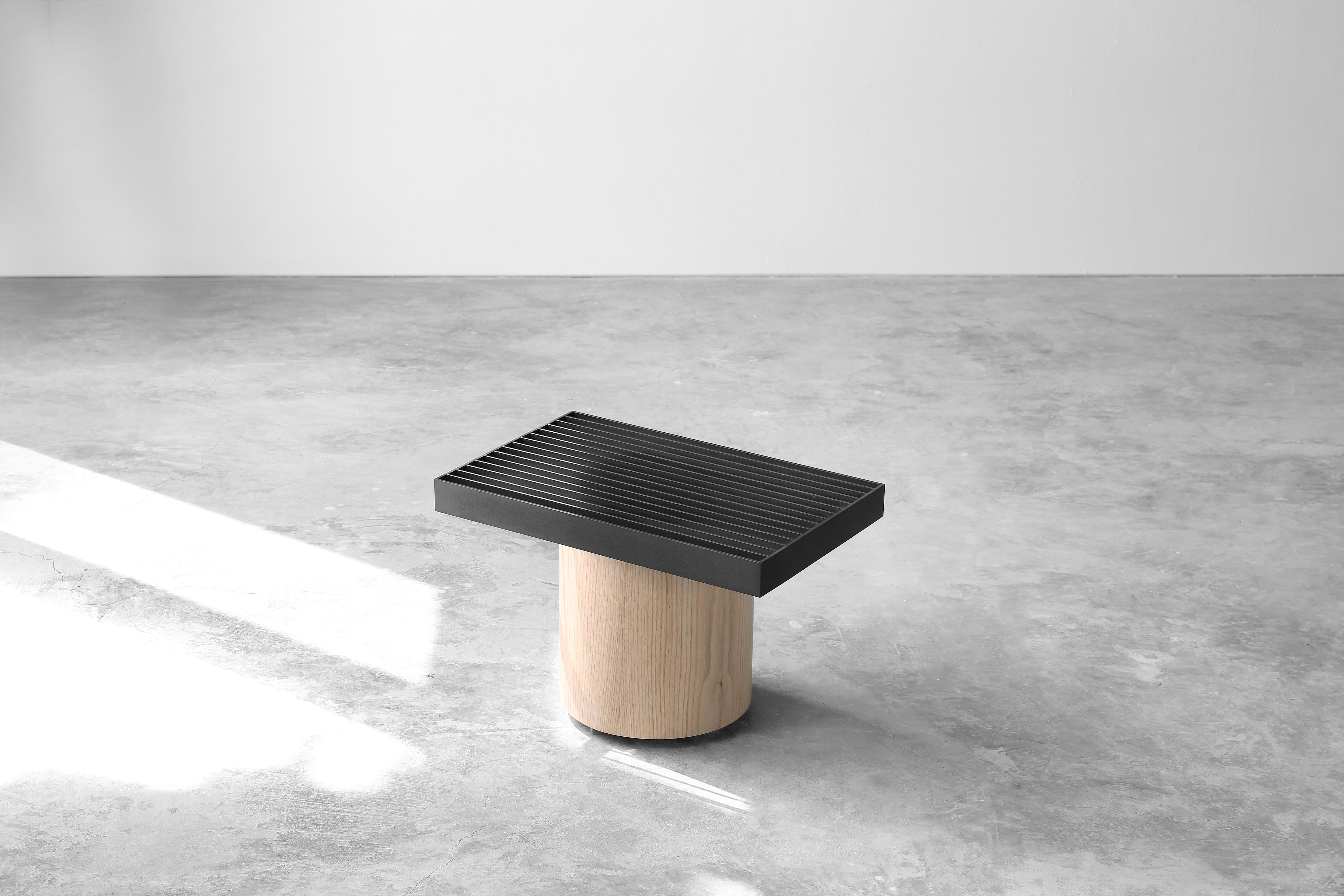 Laws of Motion Small Side Table, Night Stand in Oak and Metal Finish

Laws of Motion is a furniture collection that through a series of different typologies explores concepts like force, gravity and movement. Each of these functional sculptures