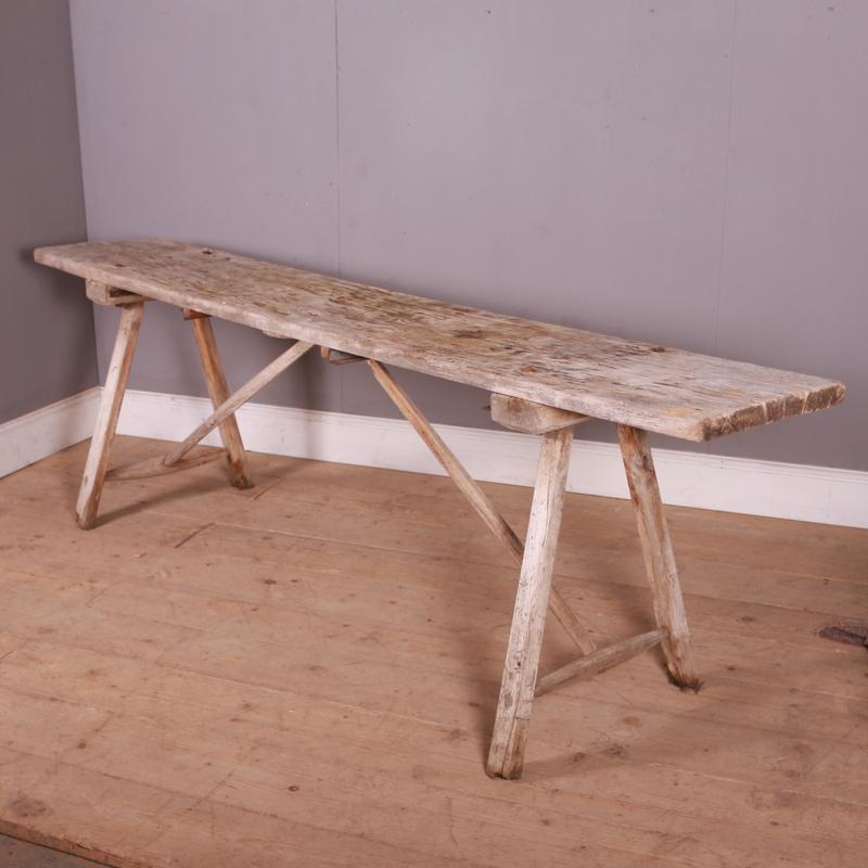 Large late 19th C scrubbed oak and poplar trestle table. Lovely rustic finish. 1890.

Top depth is 17.5