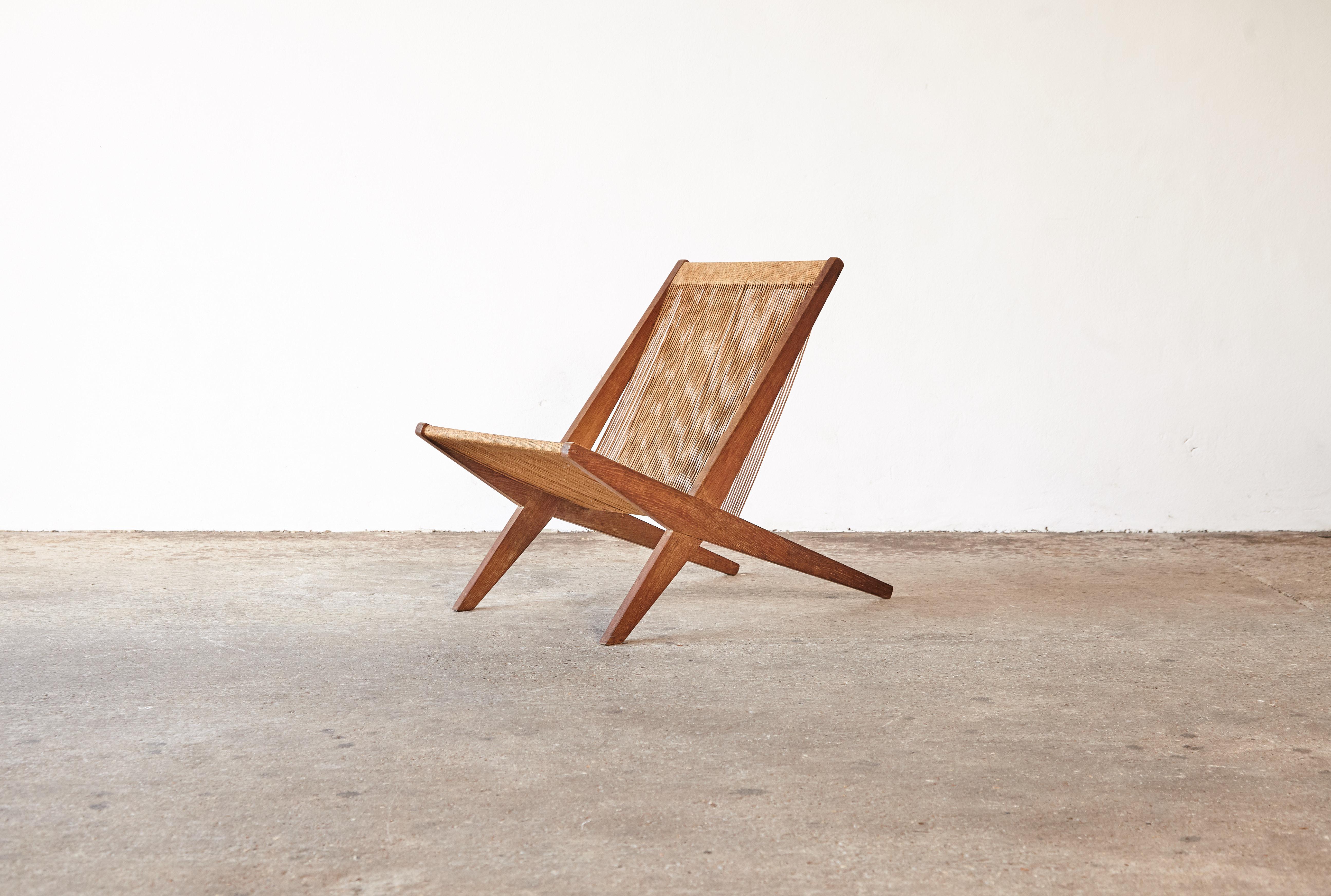 Oak and rope chair attributed to Poul Kjaerholm & Jørgen Høj for Thorald Madsen Snedkeri, Denmark, circa 1950s. In good original condition with a nice natural patina.    Fast shipping worldwide.




UK customers please note:    displayed prices do
