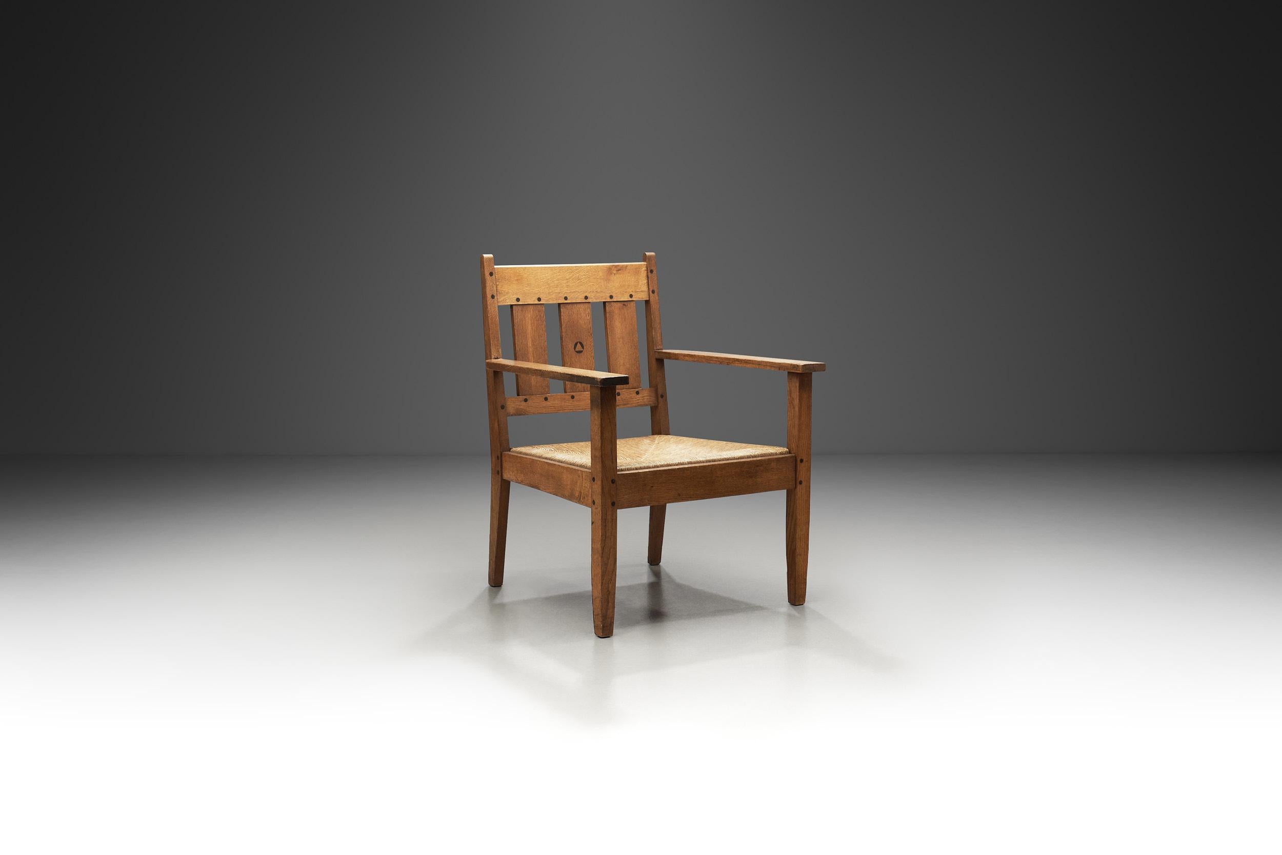 Dutch Oak and Rush Armchair by LOV, Netherlands ca 1920s For Sale