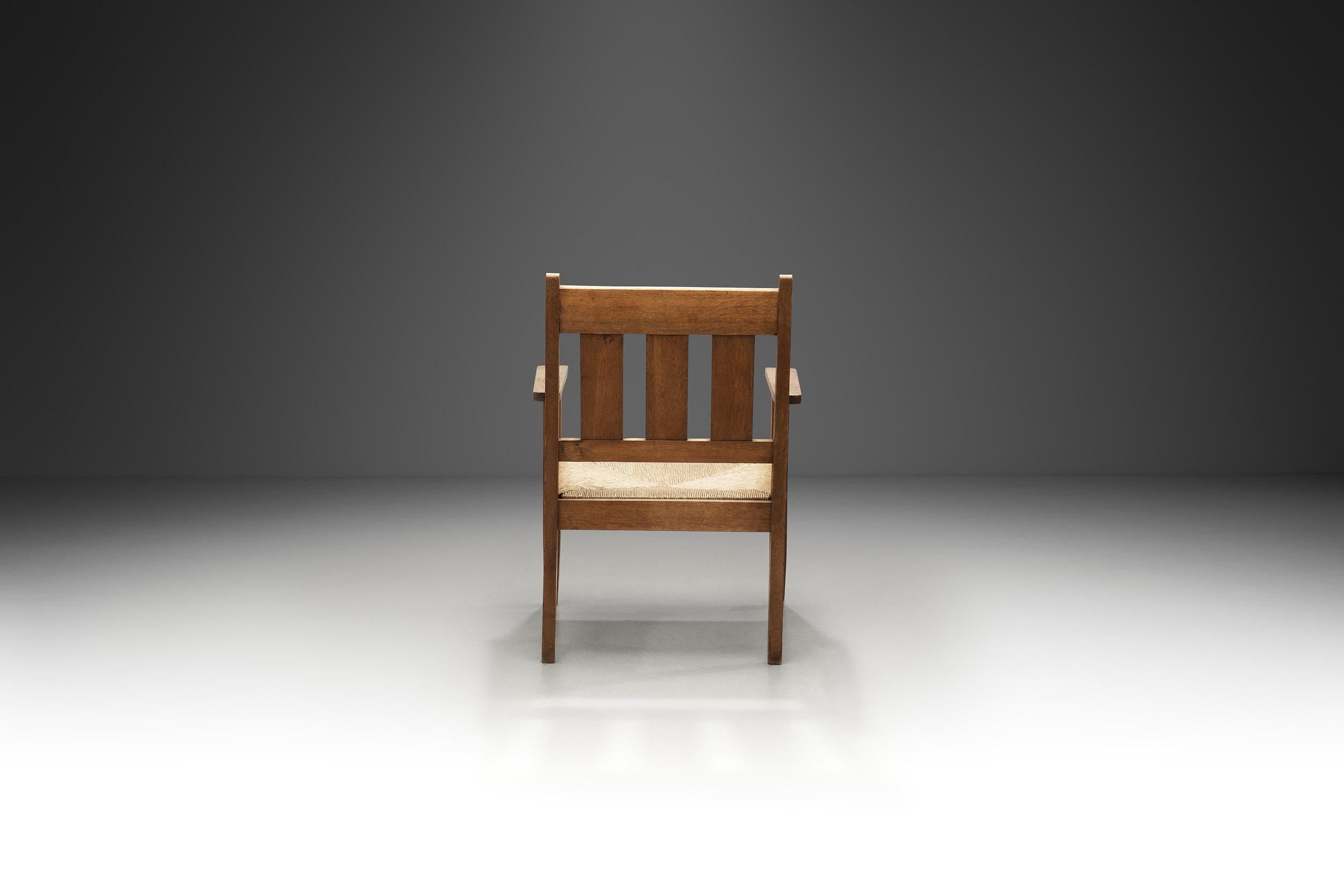 Oak and Rush Armchair by LOV, Netherlands ca 1920s In Good Condition For Sale In Utrecht, NL