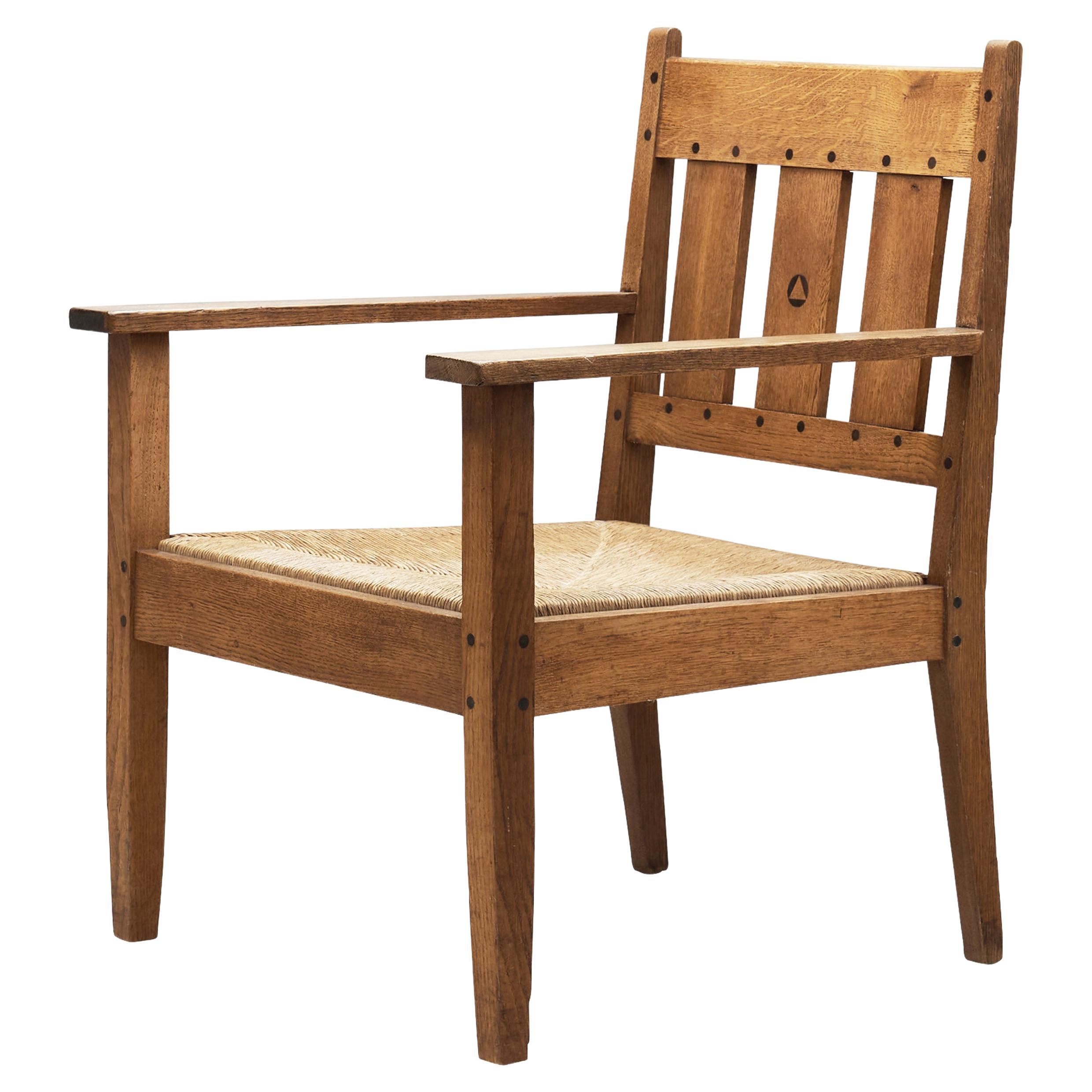 Oak and Rush Armchair by LOV, Netherlands ca 1920s For Sale