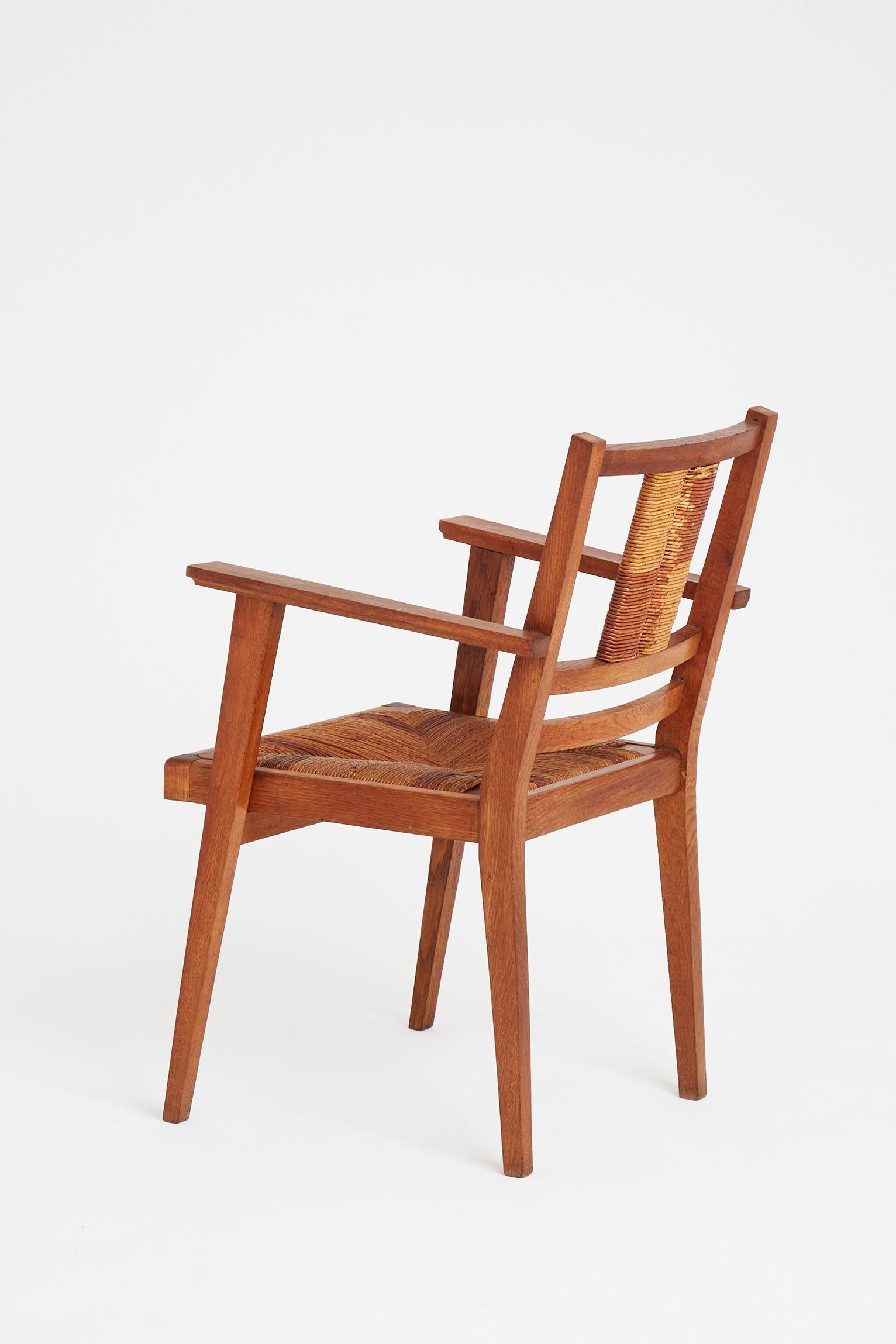 French Oak and Rush Armchair