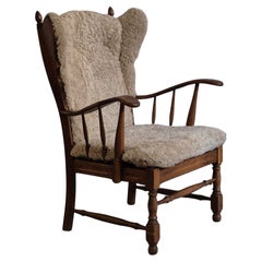 Oak and sheepskin highback armchair, Danish Midcentury