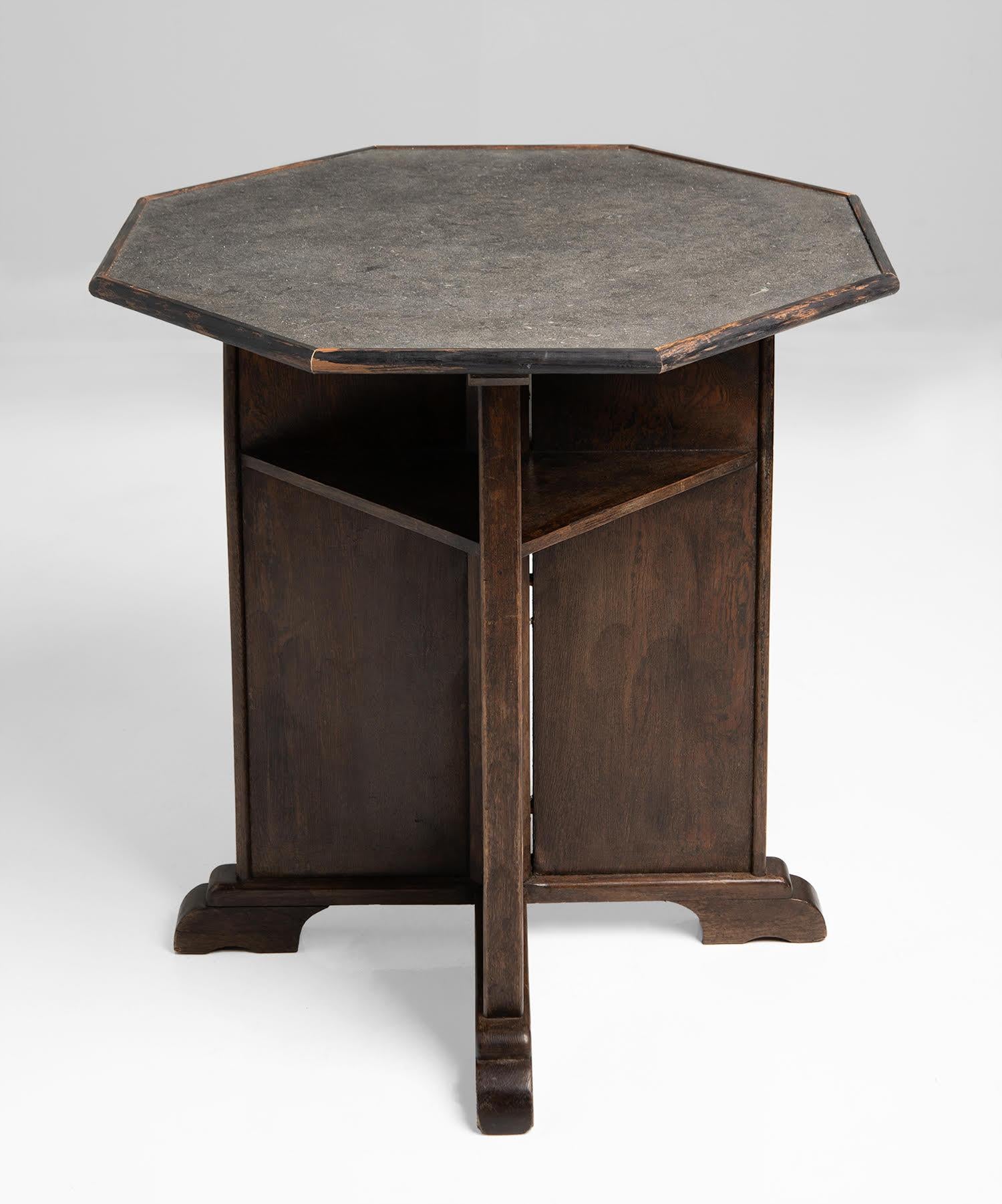 Oak and slate top gaming tables, England circa 1900.

Octagonal slate top and solid oak construction. Built-in shelving.