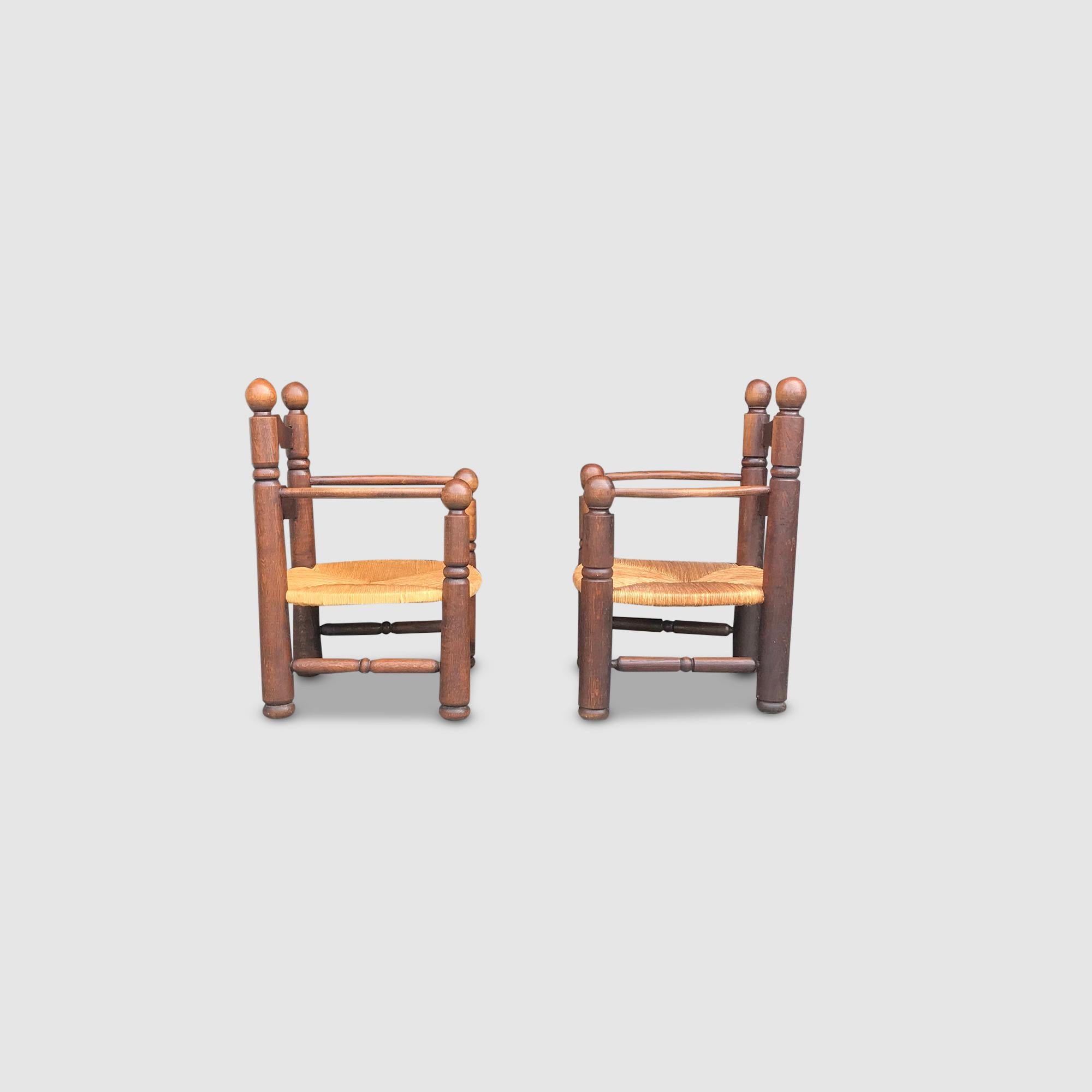 Oak and wicker Fireside armchair by Charles Dudouyt France 1950s, set of 2 In Good Condition For Sale In Stavenisse, NL