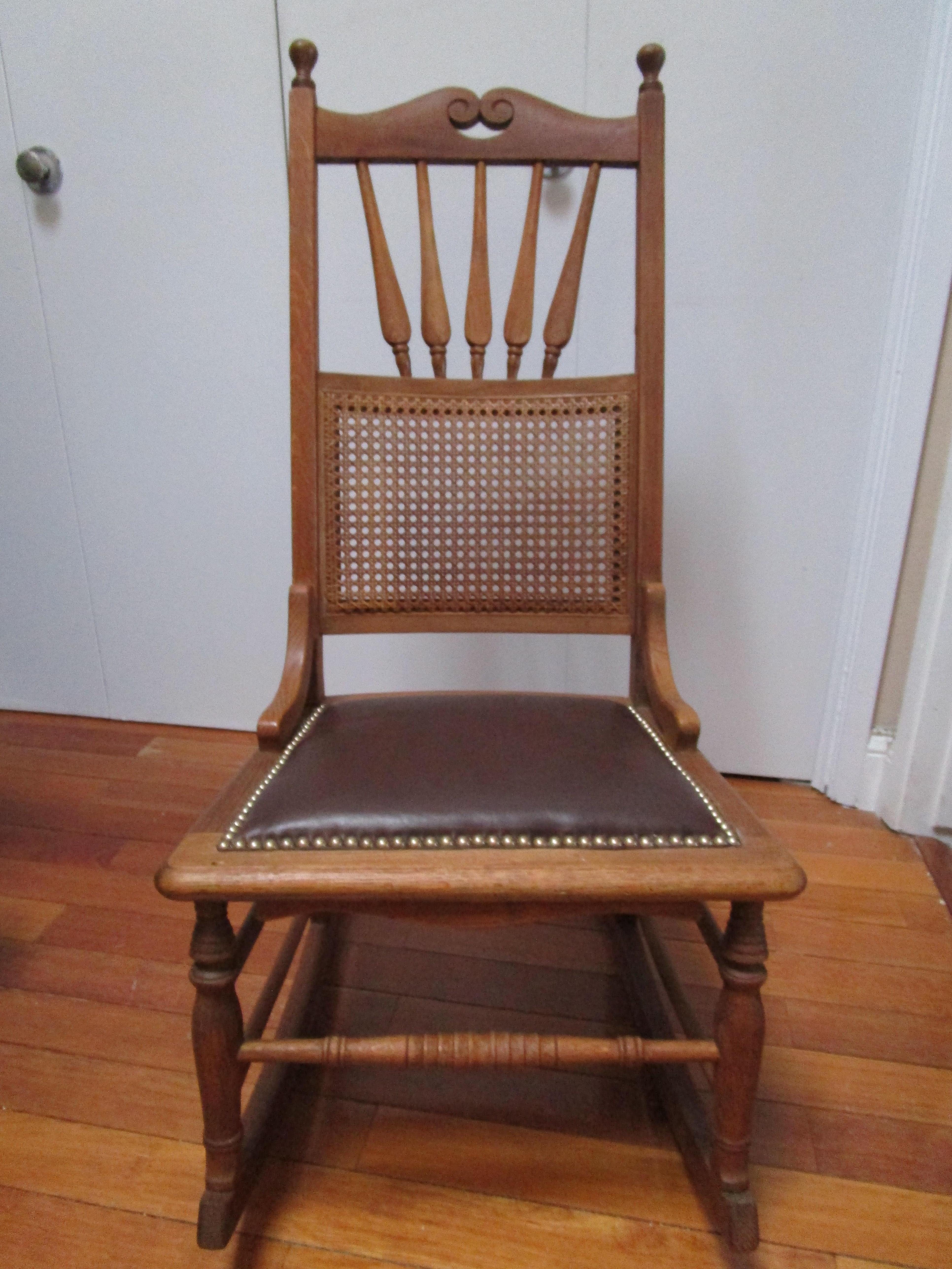 Victorian Oak Antique Rocking Chair with Clavos and Leather Seat and Cane Back For Sale