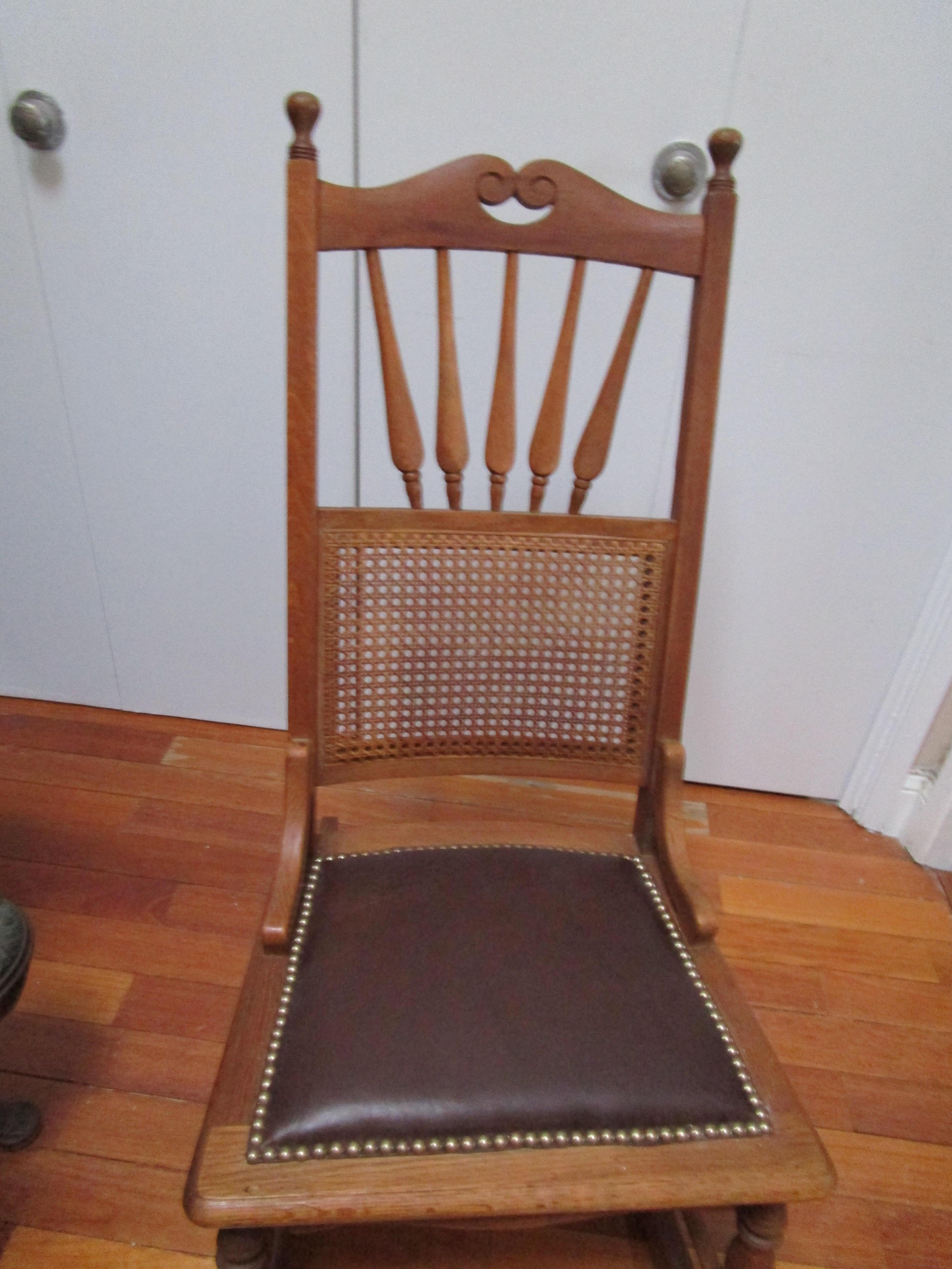American Oak Antique Rocking Chair with Clavos and Leather Seat and Cane Back For Sale