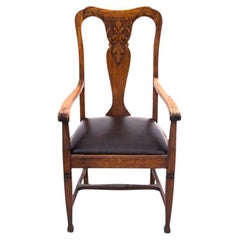 Antique Oak armchair, Western Europe, early 20th century.