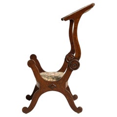 Chaise curule du XIXe siècle en noyer, recouverte d'une tapisserie à motifs floraux