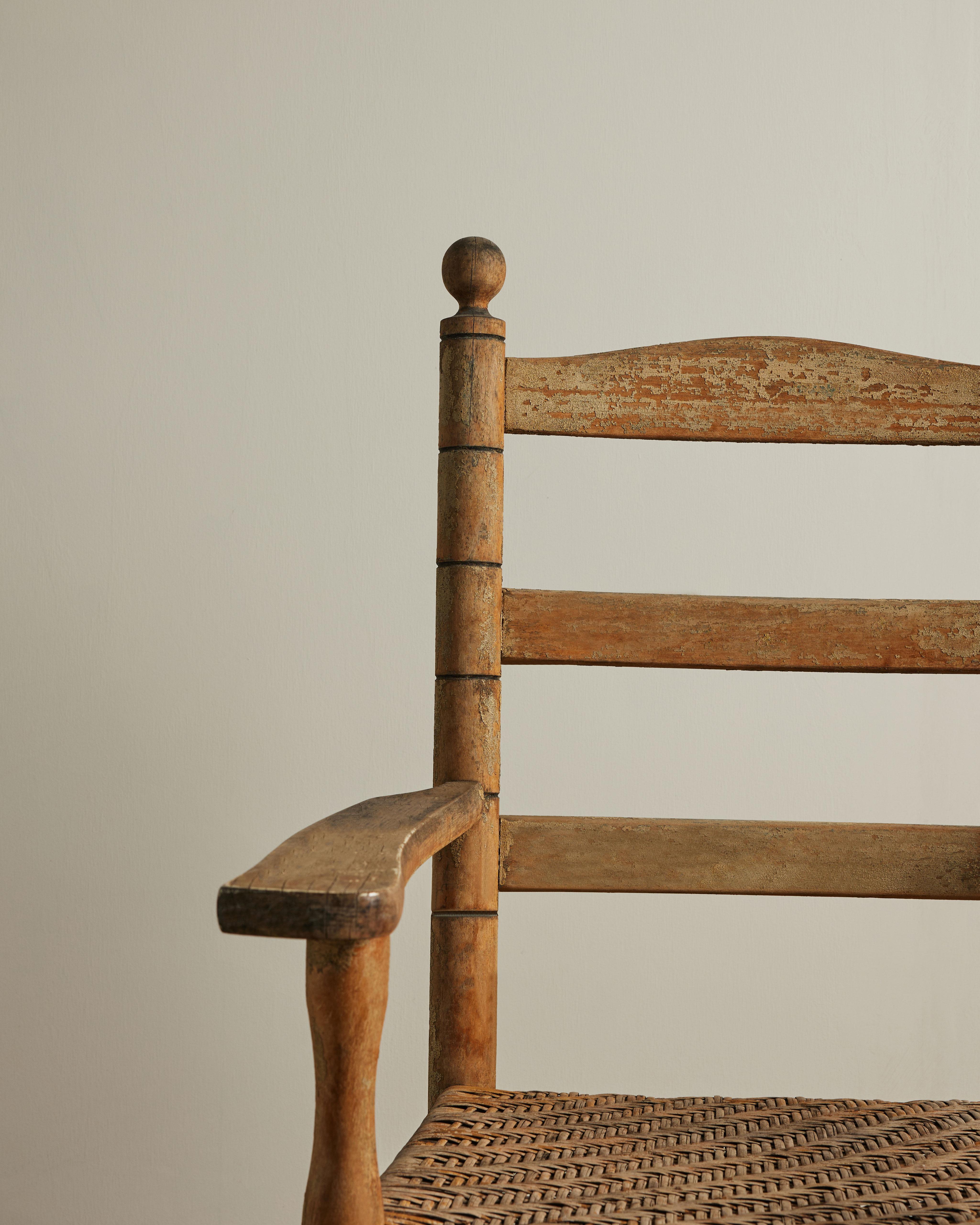 Sillón de roble con asiento de mimbre tejido, Estados Unidos, principios del s. XX en venta 2