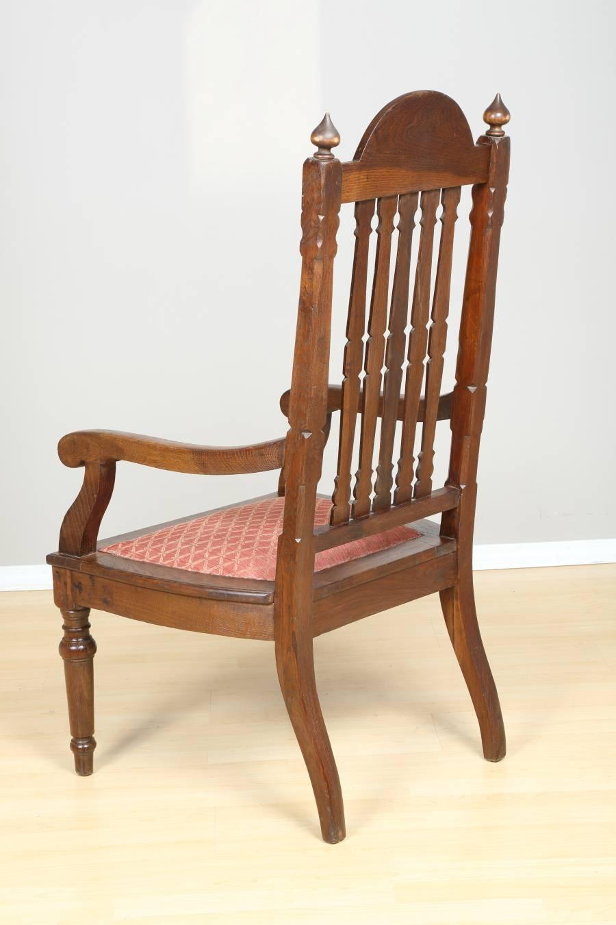 Oak armchair, circa 1850. Unique, tall, and comfortable oak armchair from Poland Biedermeier period. The chair, originally from a Polish manor, has been professionally restored, and reupholstered with new fabric. Measures: Seat height: 17.5