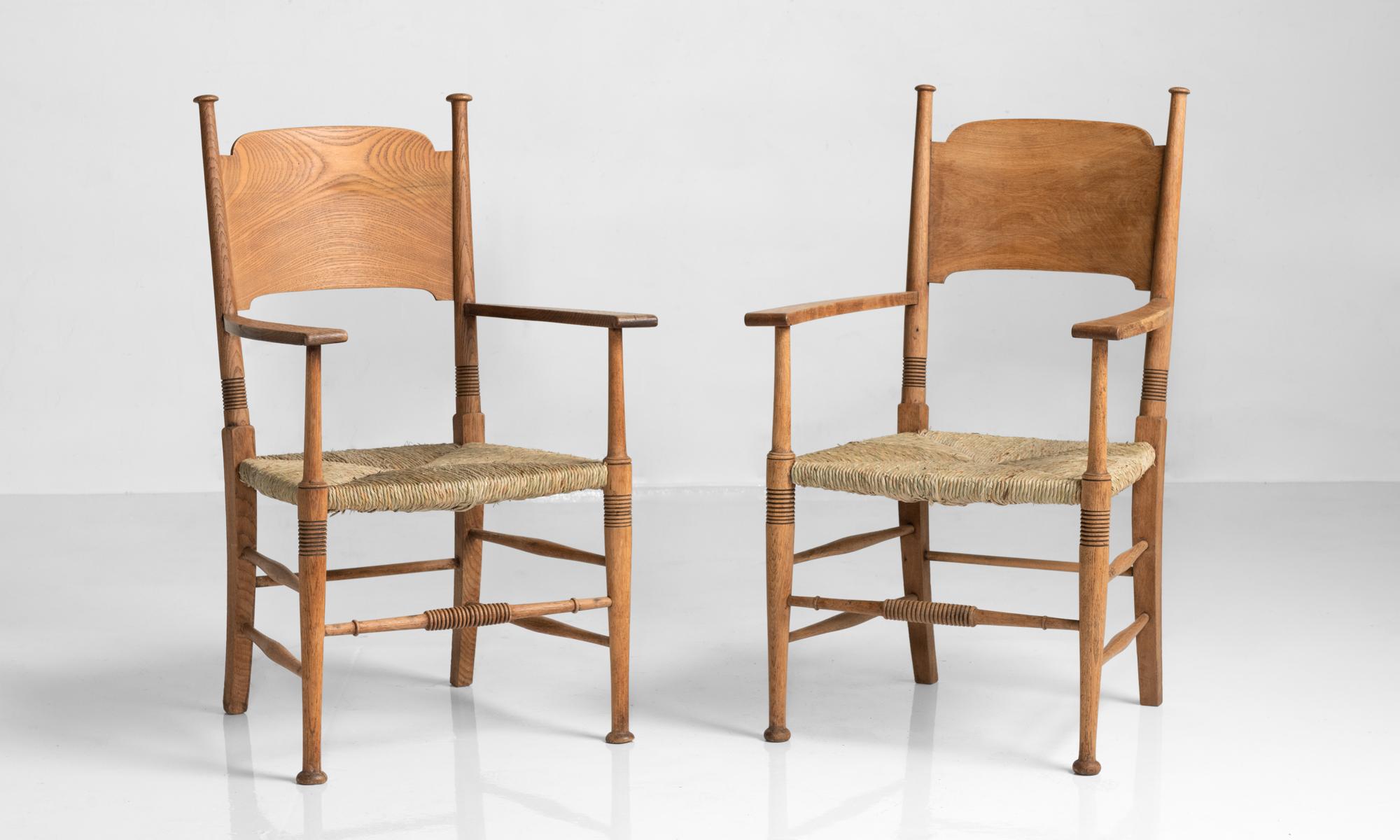 Oak Armchairs by William Birch, England, circa 1890

Solid oak frame with newly rushed seats. Designed by William Birch and produced in High Wycombe.