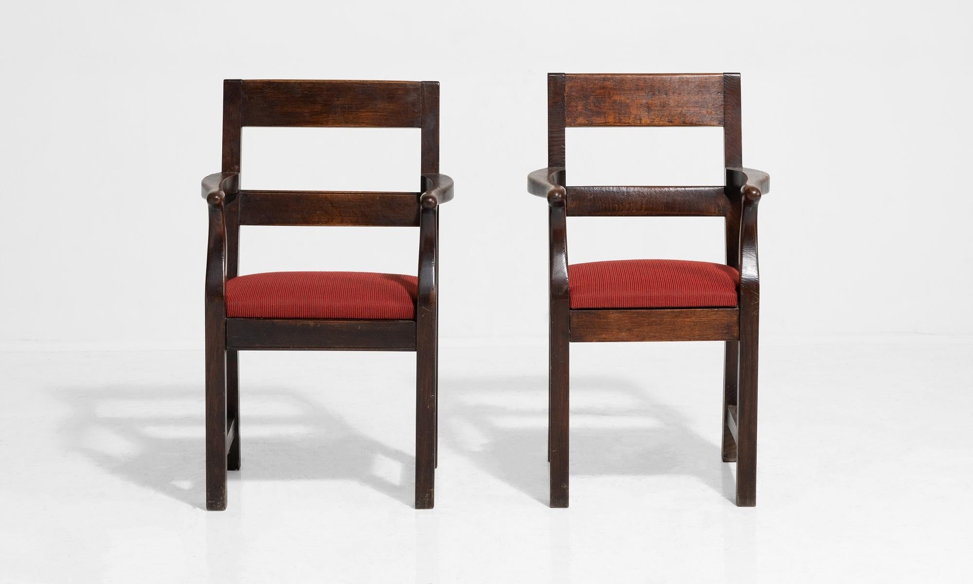 Near pair of handsome oak chairs with newly upholstered seat.