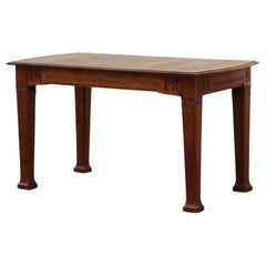 Oak Art Deco dining table with carved frieze, France 1920s