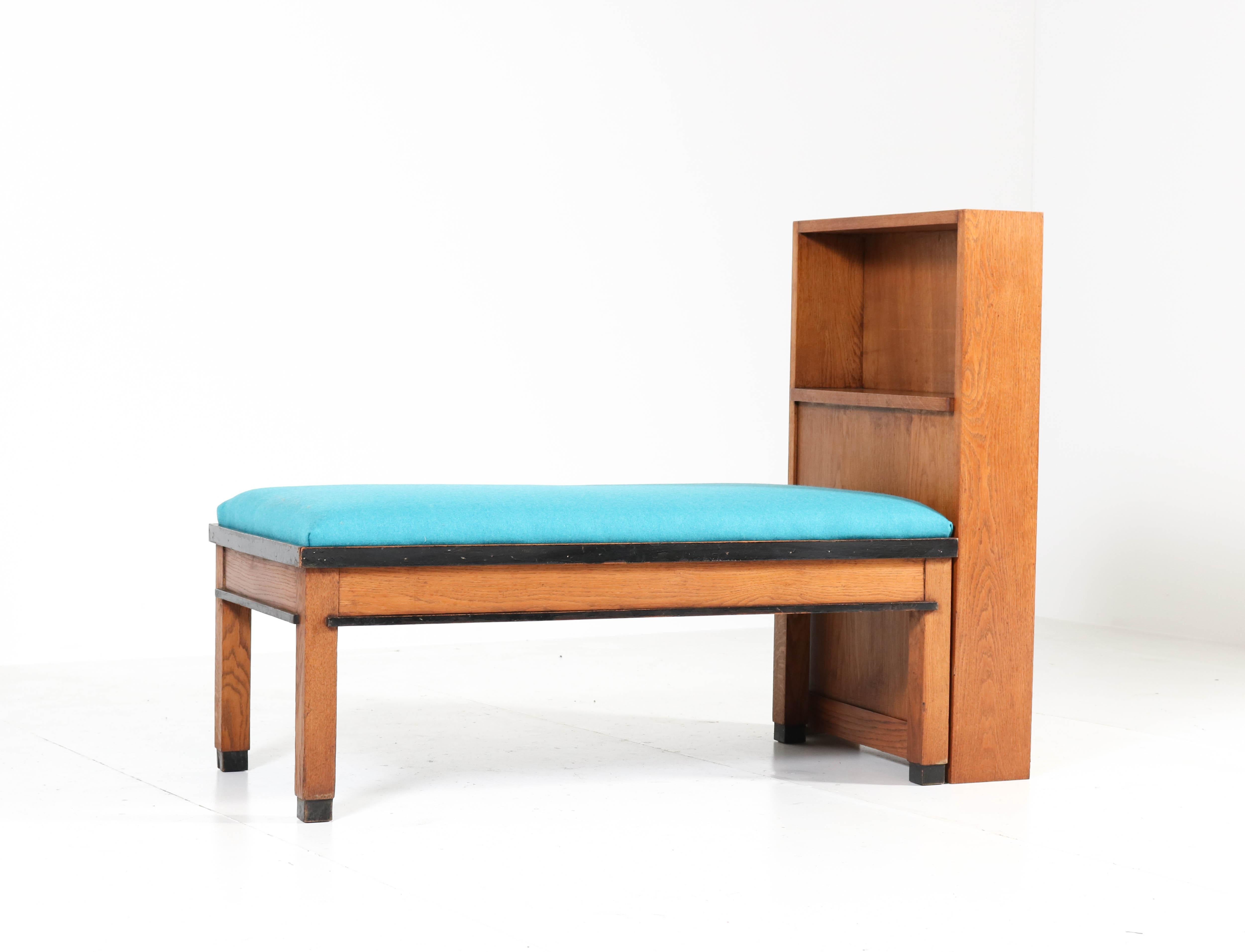 Wonderful and rare Art Deco Haagse School sofa with bookcase.
Design by Jan Brunott.
Striking Dutch design from the 1920s.
Solid oak and oak veneer and re-upholstered with Italian fabric.
The bookcase can be attached to the sofa in two positions