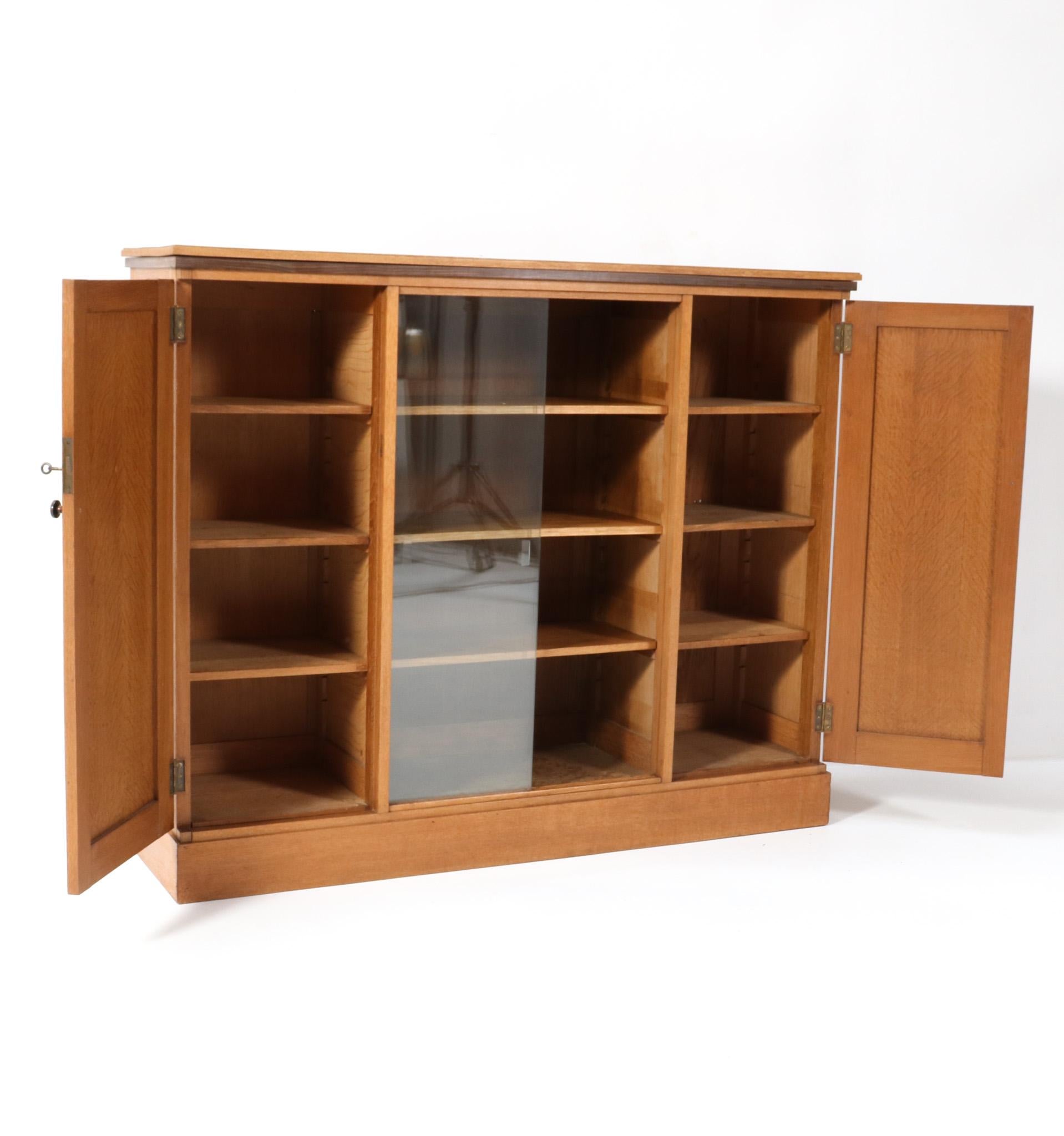 Oak Art Deco Modernist Bookcase with Glass Sliding Doors, 1920s In Good Condition For Sale In Amsterdam, NL