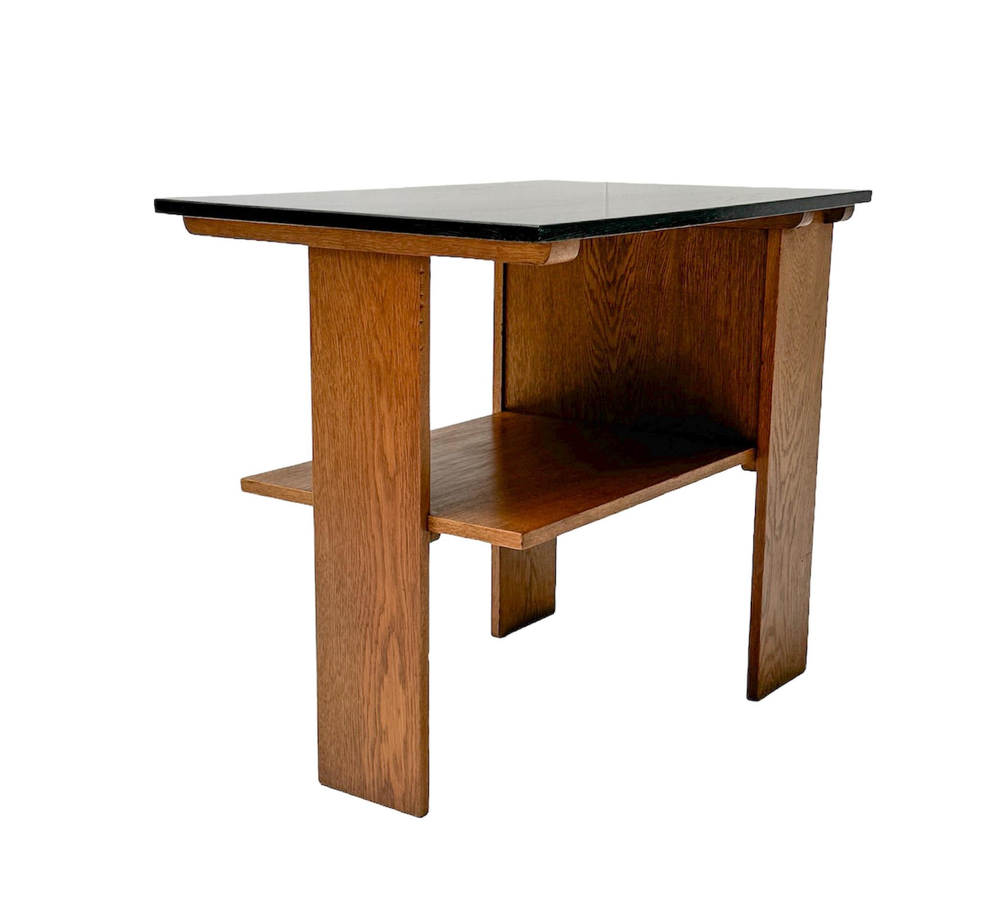 Magnificent and rare Art Deco Modernist serving table.
Design by Cor Alons for Winterkamp & Van Putten.
Striking Dutch design from the 1920s.
Solid oak asymmetrical base with original black lacquered top.
This wonderful Art Deco Modernist serving