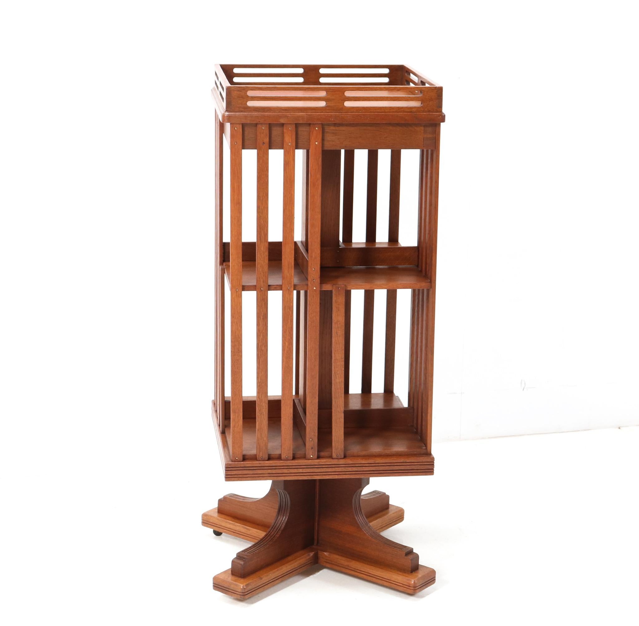 Stunning Art Nouveau Jugendstil revolving bookcase.
Striking Dutch design from the 1900s.
Solid oak and the wheels are in good working order.
This wonderful Art Nouveau Jugendstil revolving bookcase is in very good condition with minor wear