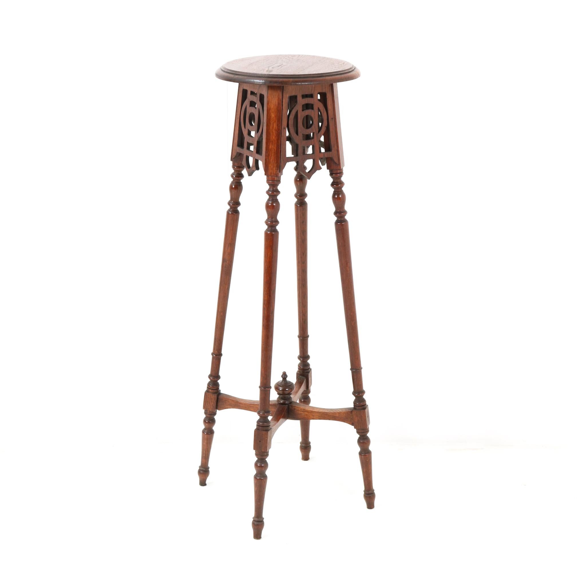 Magnificent and rare Art Nouveau pedestal table or plant stand.
Striking Dutch design from the 1900s.
Solid oak with original hand-carved elements.
This wonderful Art Nouveau pedestal table or plant stand will be a true eye catcher in your living