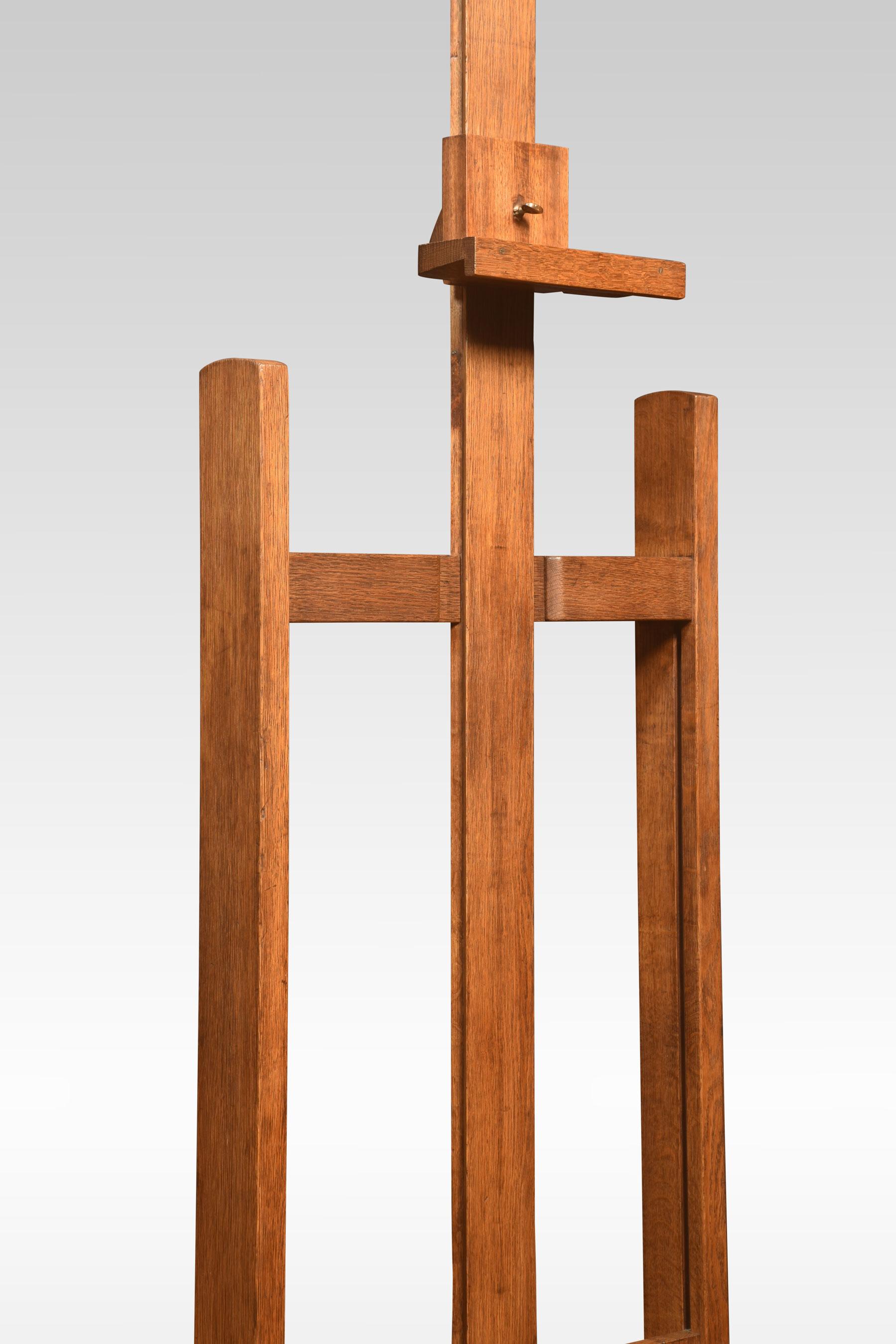 Oak artist’s adjustable studio easel raised up on trestle base terminating in casters.
Dimensions
Height 73 Inches adjustable to 106.5 Inches
Width 24 Inches
Depth 28 Inches.