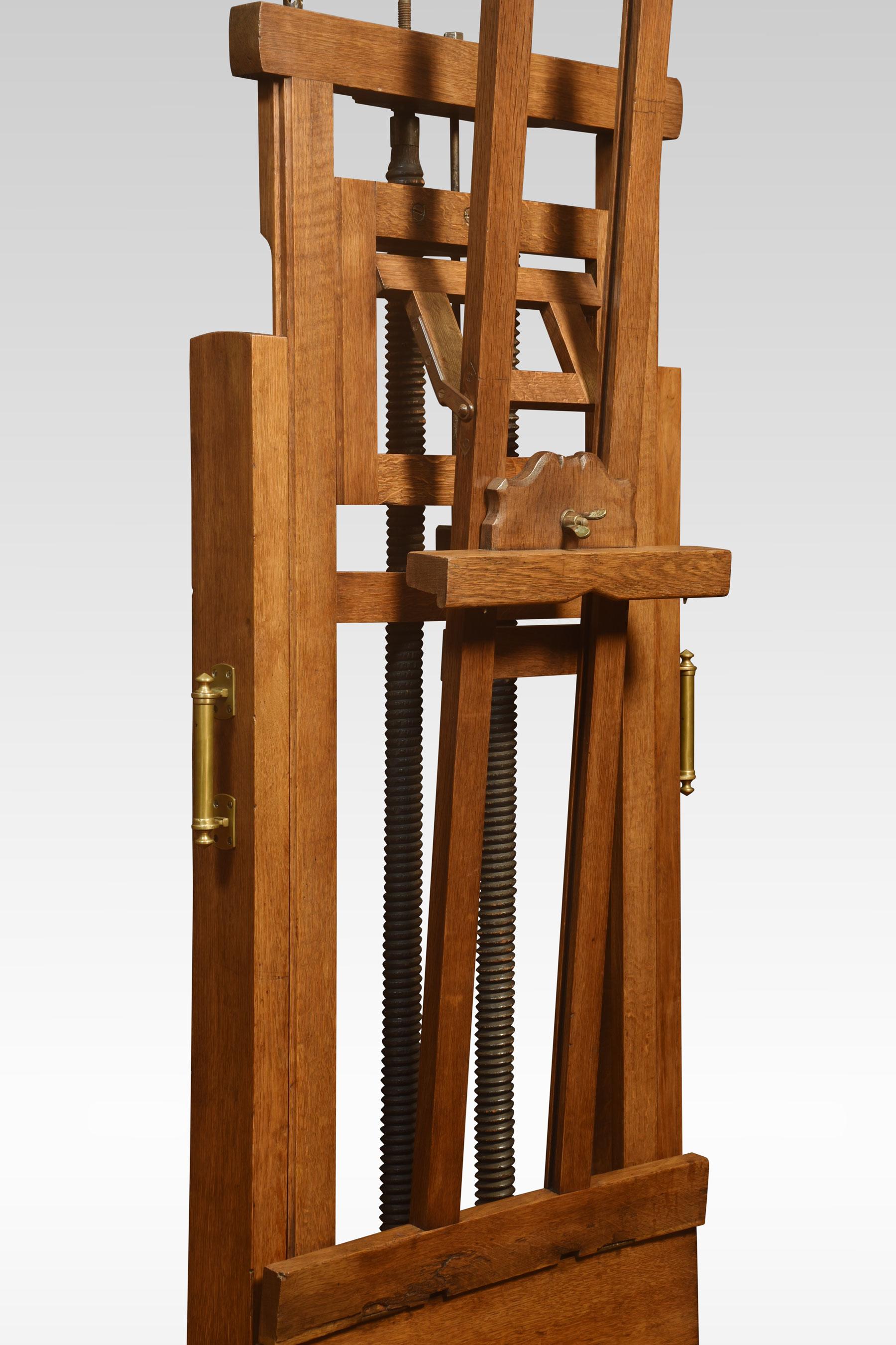 Large oak artist’s fully adjustable studio easel raised up on trestle base terminating in four casters
Dimensions
Height 66 Inches ajustable to 99 Inches
Width 25.5 Inches
Depth 25.5 Inches.