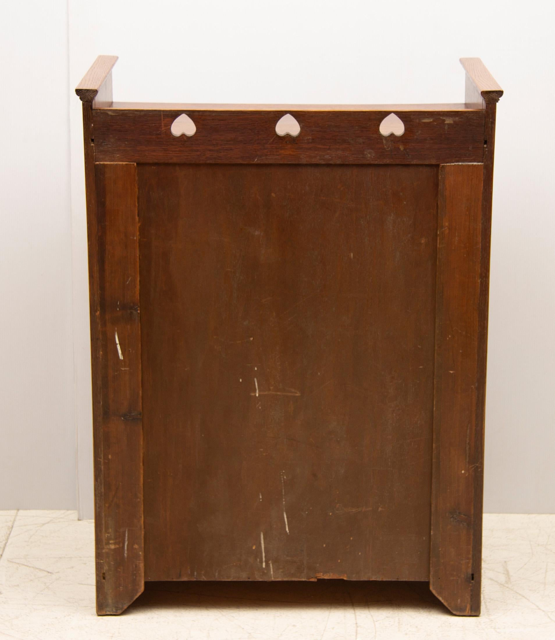 Oak Arts & Crafts cabinet.