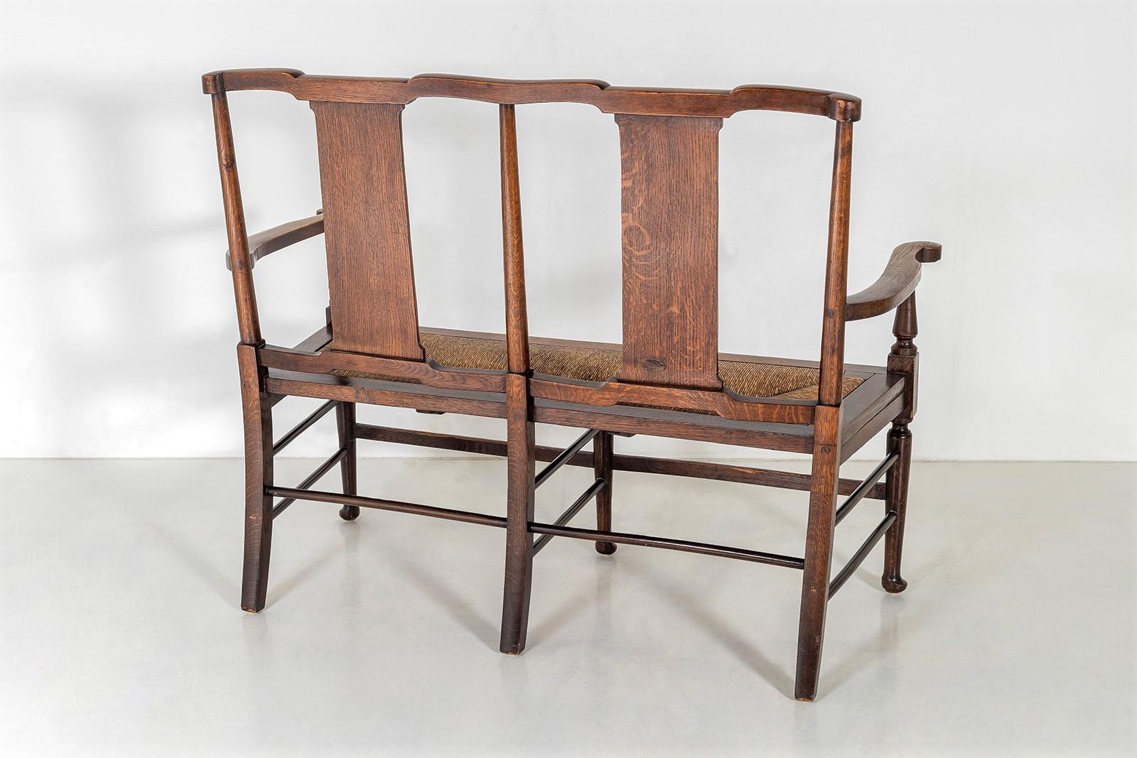 Oak Arts & Craft Bench with Rush Seat in the manner of William Morris & Co In Good Condition In Llanbrynmair, GB