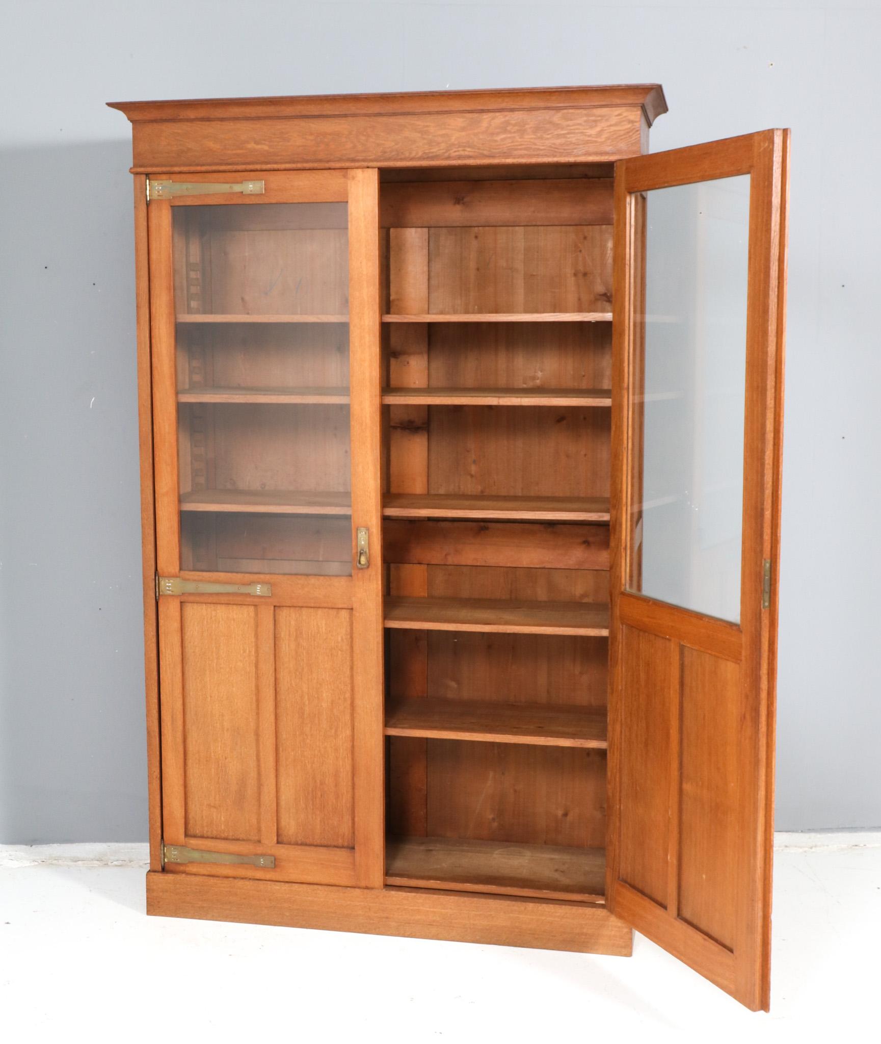 Dutch Oak Arts & Crafts Art Nouveau Bookcase, 1900s For Sale