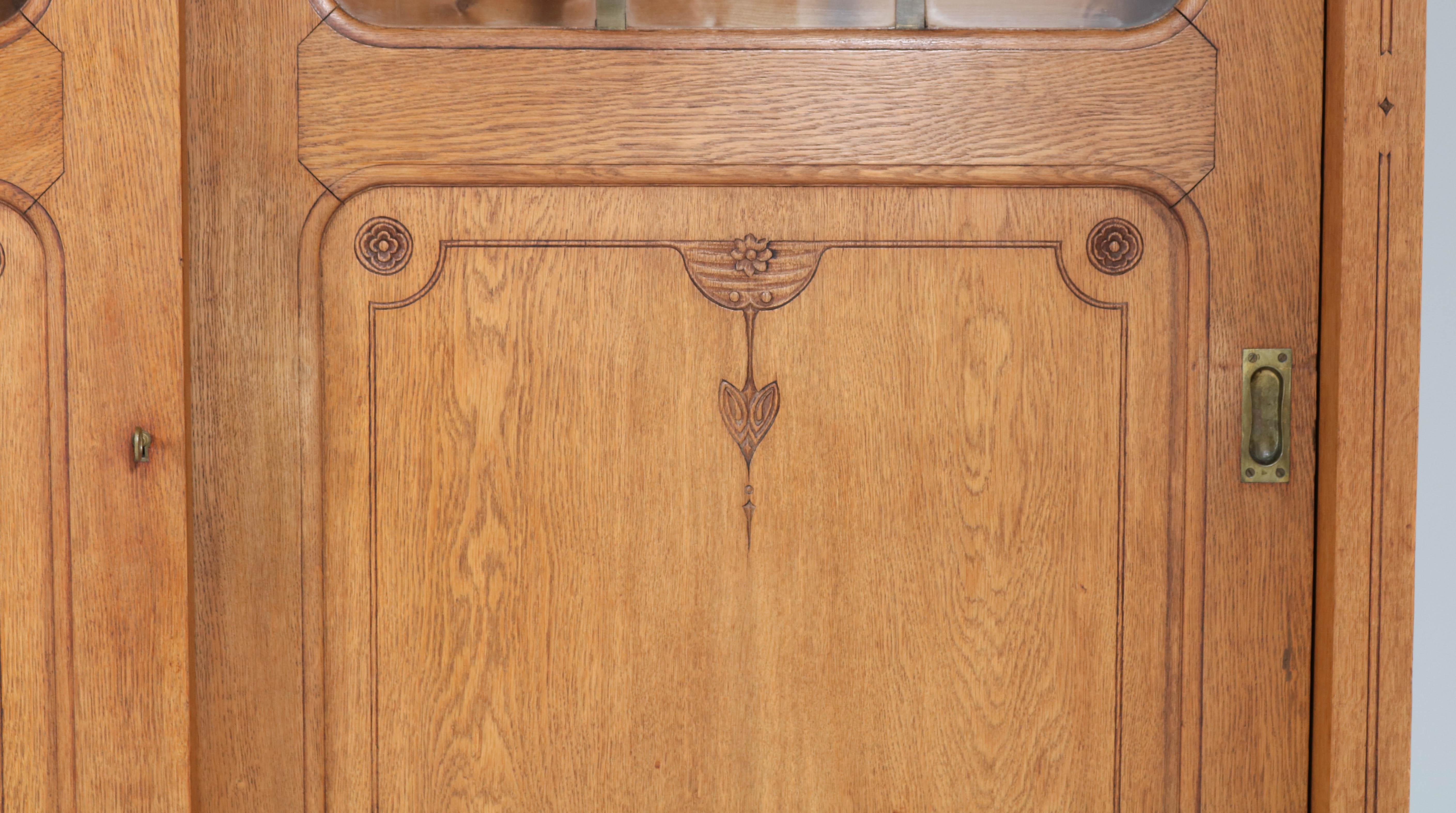 Dutch Oak Arts & Crafts Art Nouveau Bookcase with Original Sliding Doors, 1900s