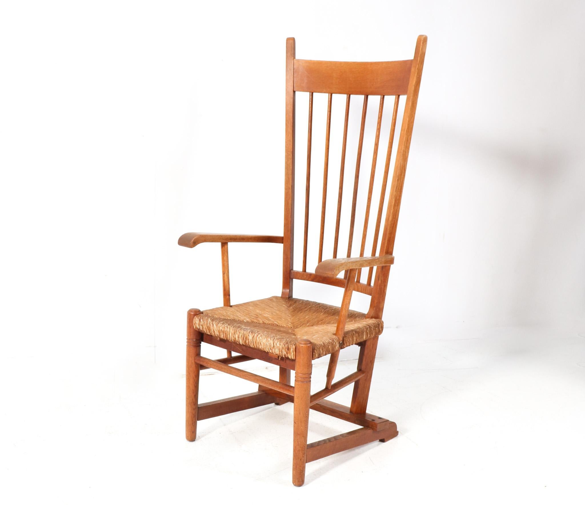 Dutch Oak Arts & Crafts Art Nouveau High Back Armchair with Rush Seat, 1900s For Sale